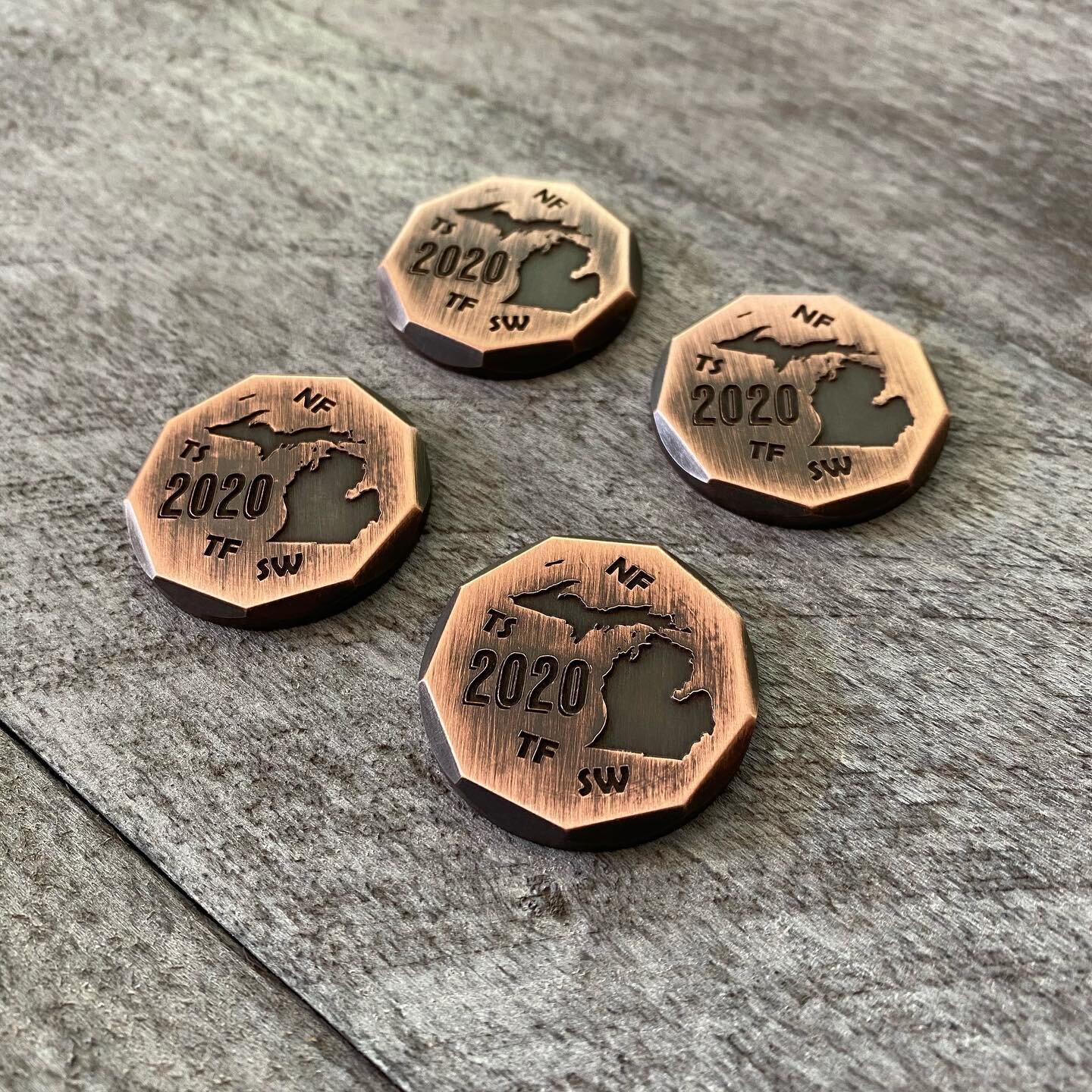 9-Way Milled Copper Ball Marker Set we did recently for a golf trip. These got the Antiqued finish.