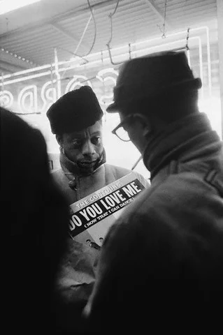 James Baldwin in Harlem, 1963. Photo by Steve Schapiro.