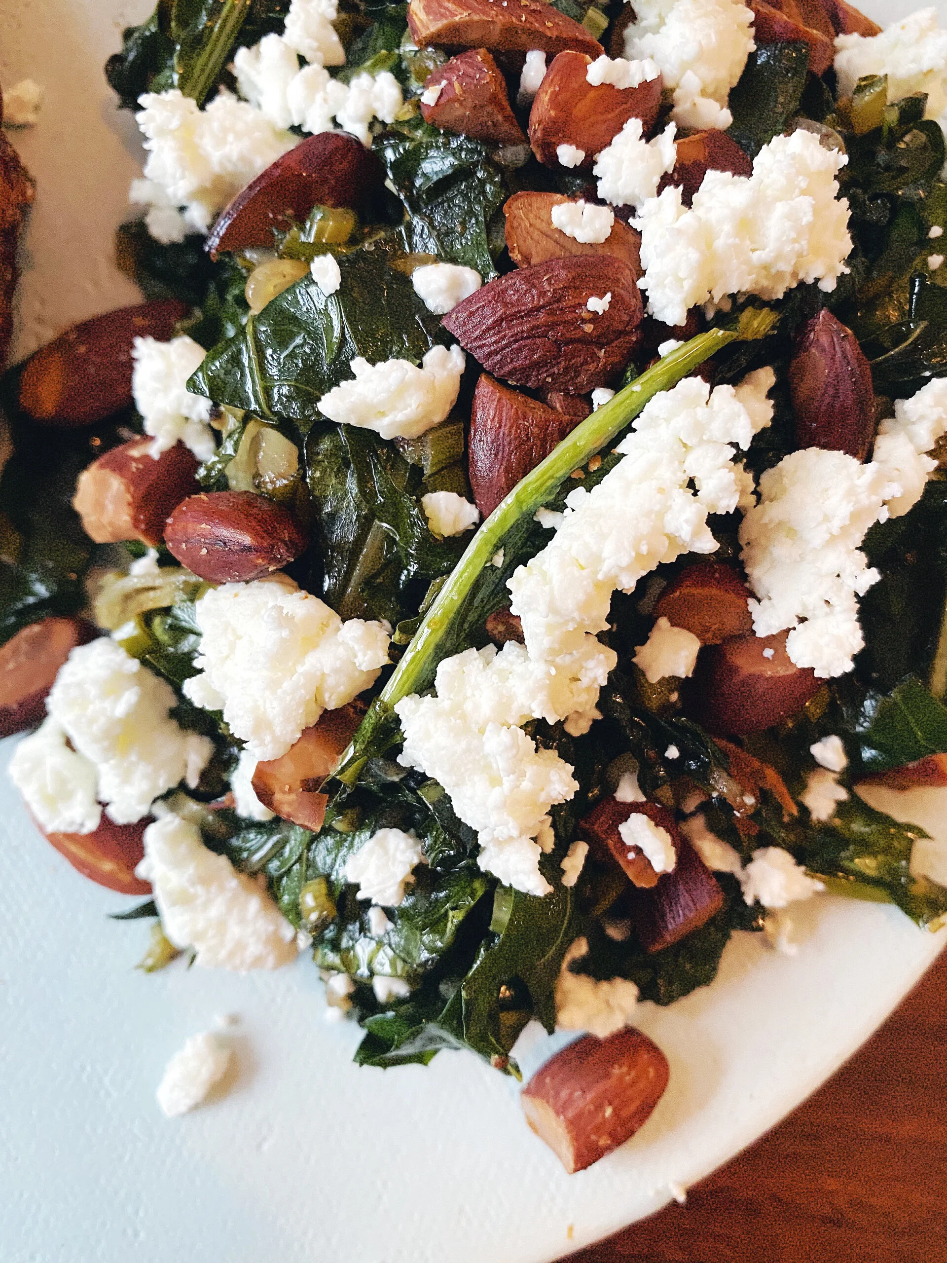 Sautéed Dandelion Greens with Toasted Almonds & Sheep’s Milk Cheese