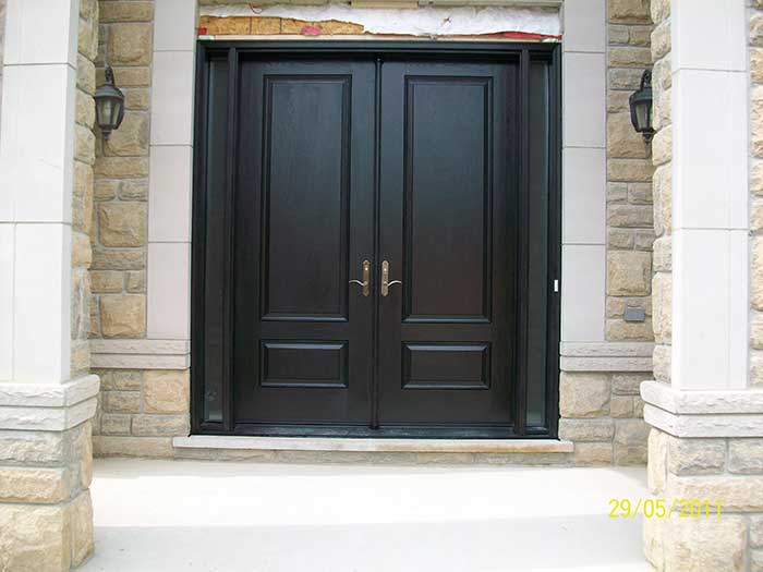 Executive-Doors-8-Foot-Double-Solid-Parliament-Front-Doors-with-2-Slim-Side-Lites-and-Multi-Point-Locks-Installed-in-Custom-home-.jpg