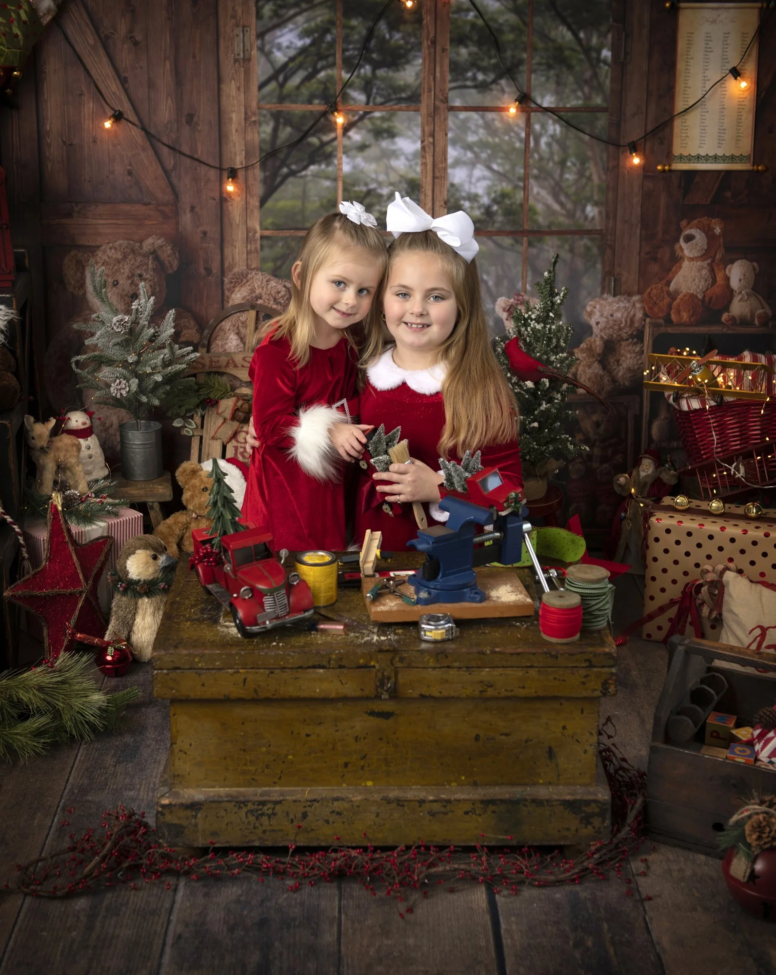 Sisters in Santa dress in Santa's Workshop.jpg