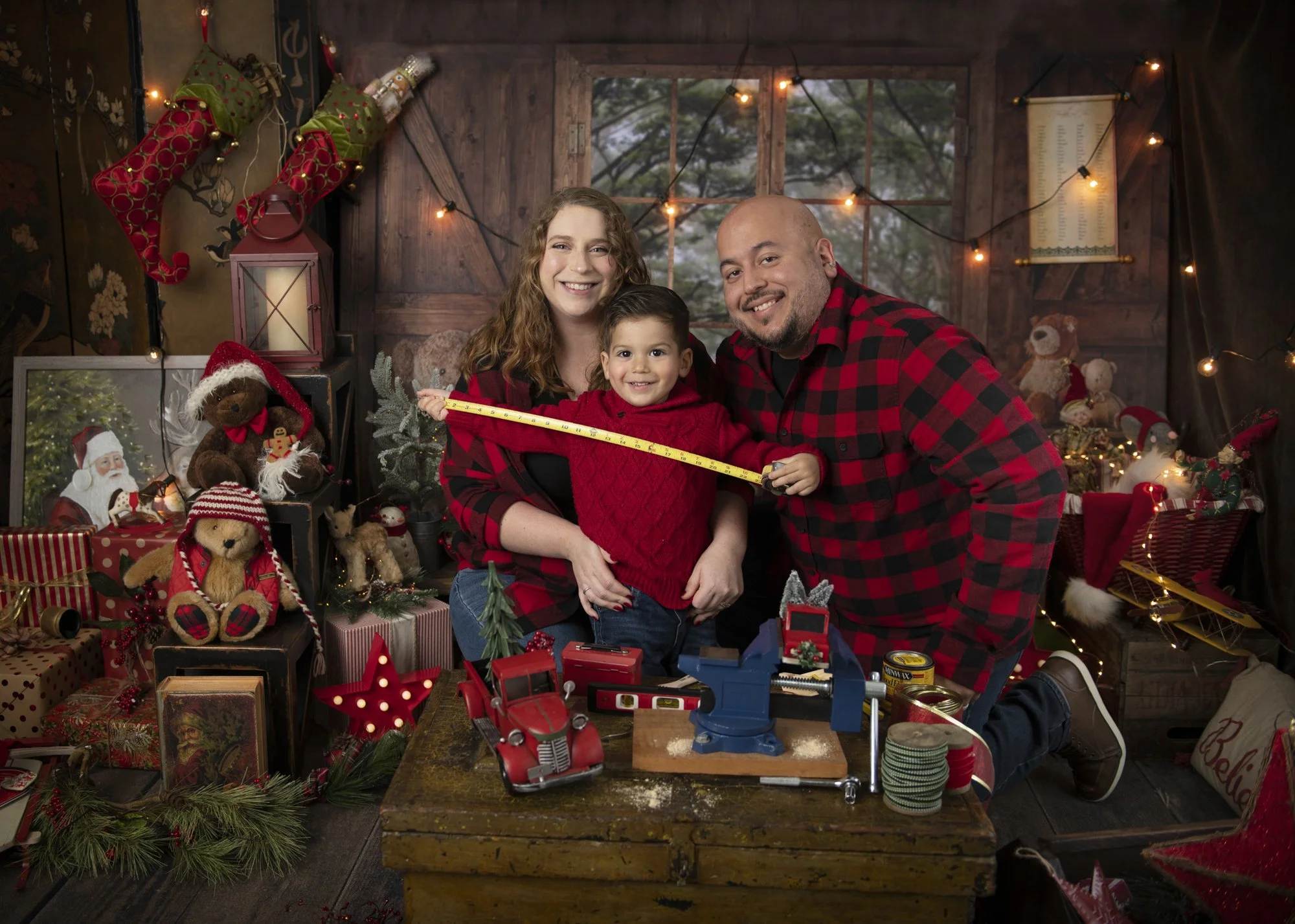 Parents with young boy at Christmas Session.jpg