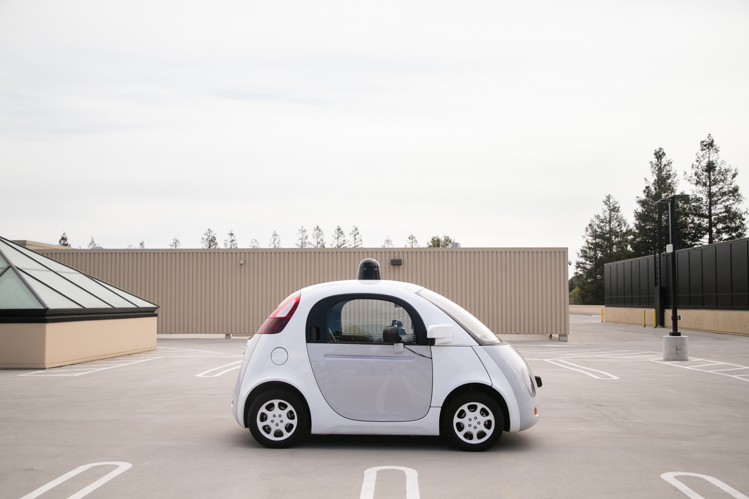  A prototype self-driving car is seen on the roof of a Google campus building in Mountain View, California 