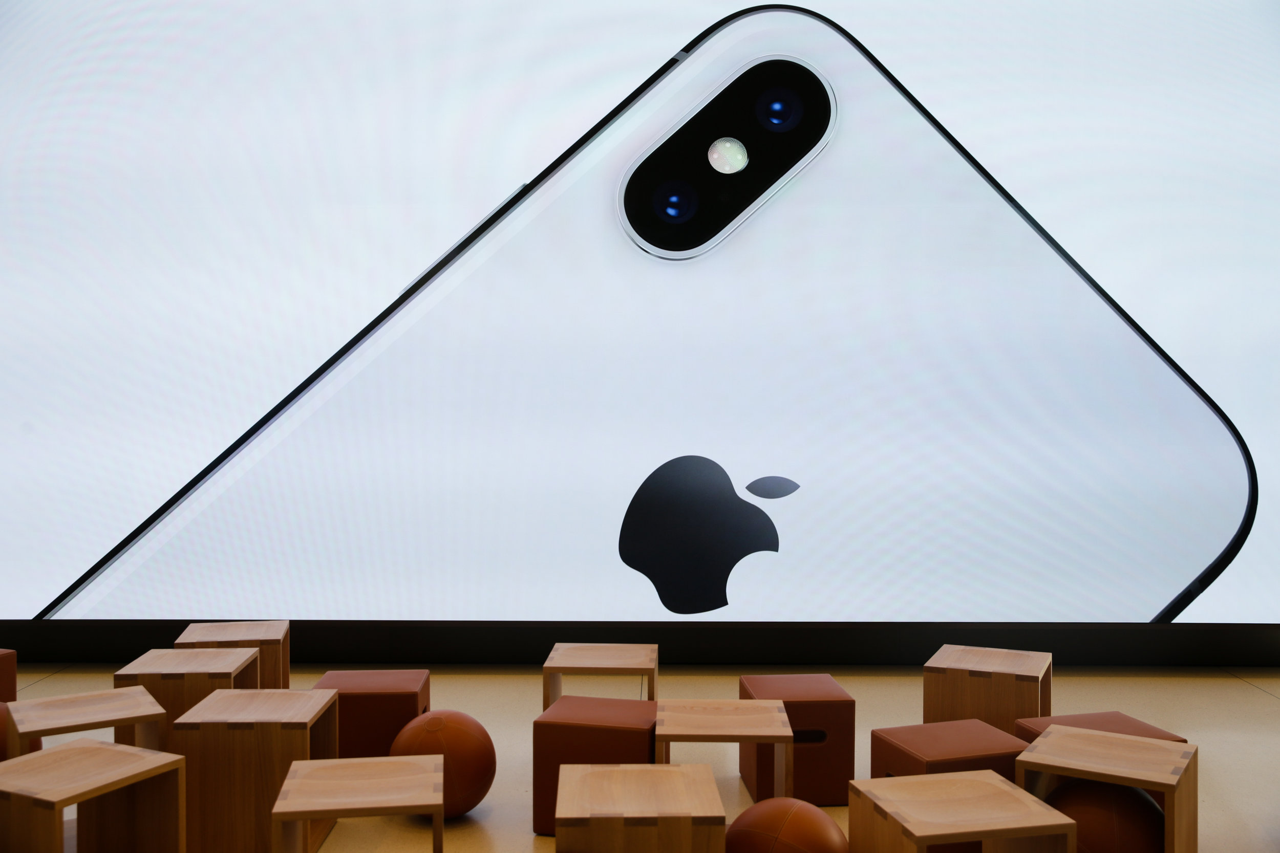  A large screen displays an image of the iPhone X at the Apple Park Visitor Center in Cupertino, California 