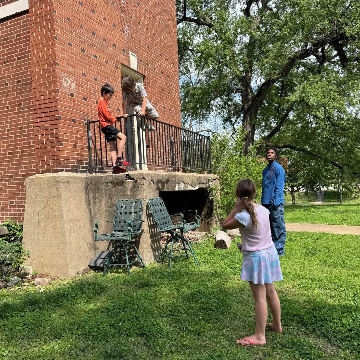 A Sudbury student was having a hard time getting down from a balcony that he climbed up on. Several other students offered some suggestions, stayed with him, and shared some encouraging words. He was still struggling and starting to get pretty frustr