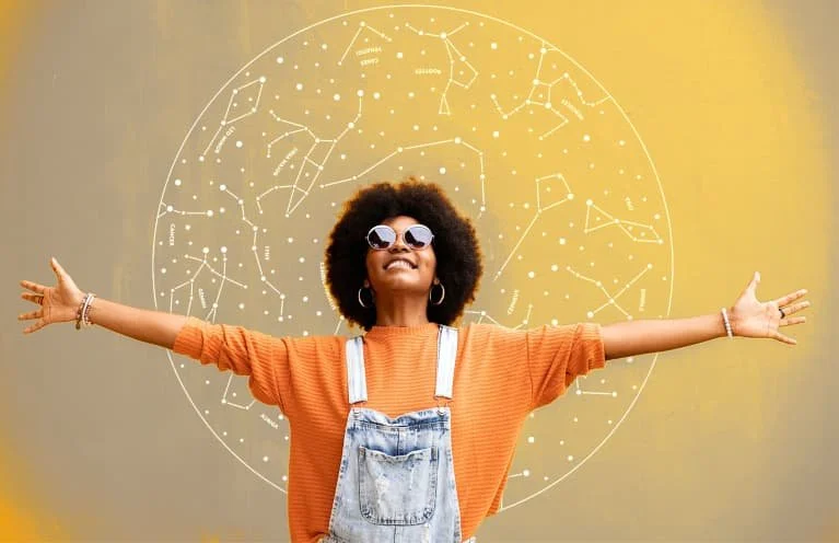 happy-afro-woman-smiling-wearing-sunglasses.jpeg