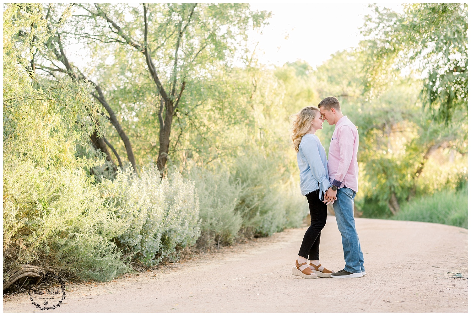 What to wear to your enggement session. Chambray top and pink button down. Engagement session in Tucson, Arizona at sweet water wetlands park by Tucson Wedding Photographer Melissa Fritzsche Photography.