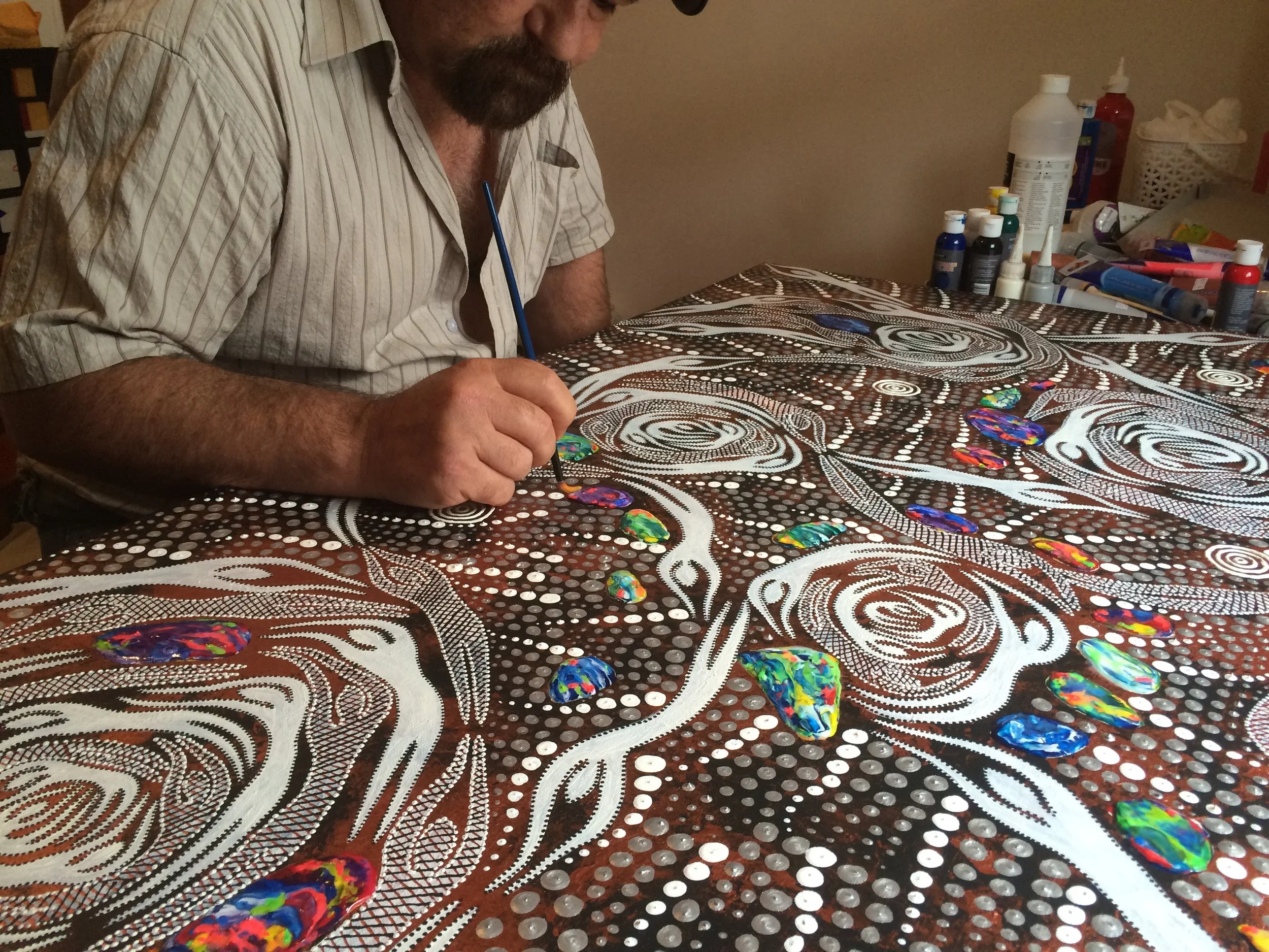 Artist Geoff Sellman nears completion of the Lifewear commission.