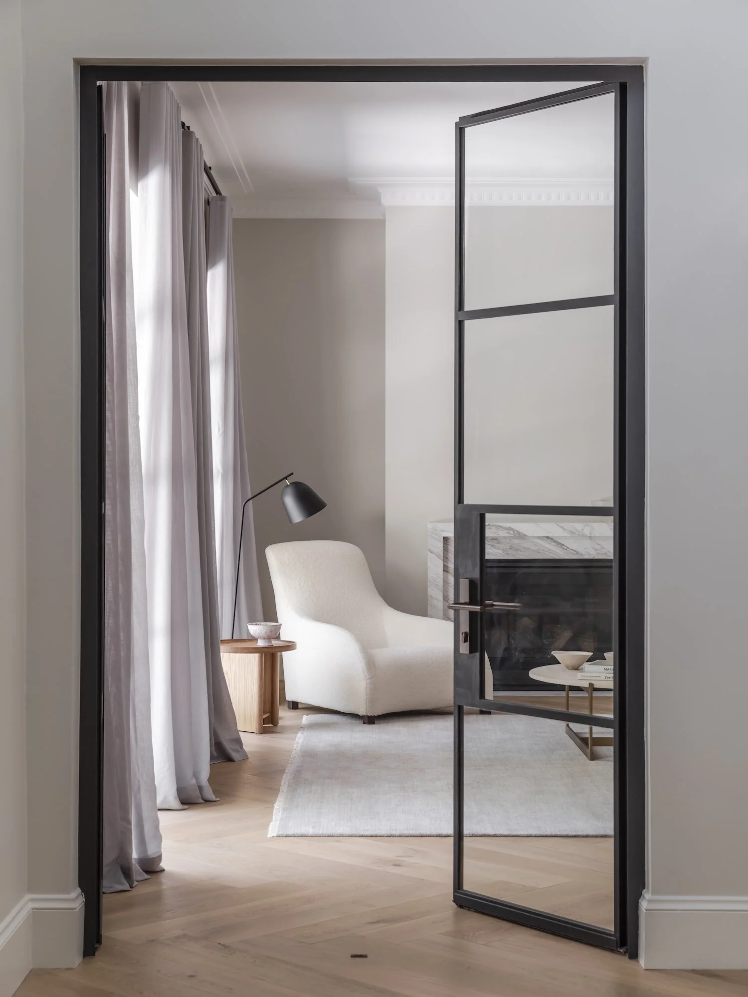 Lindfield House   Interior designer, architect and furniture designer  Daniel Boddam  reimagines a 1980s home in  Sydney’s Upper North Shore.   This Sydney home was in need of a full revamp, for clients who requested a modern image with a  mid-century  twist. Renowned for creating calm and refined spaces,  Daniel Boddam  and stylist  Studio CD  set out to transform the double-storey home into a timeless abode fit for years to come.  We take a closer look at the design-led product selection and explore how to achieve this considered home’s look with pieces from  Daniel Boddam Furniture  + NORR11’s NY11 Bar stools in Natural Oak and Vintage ‘Camel’ leather.  Photos by Pablo Veiga