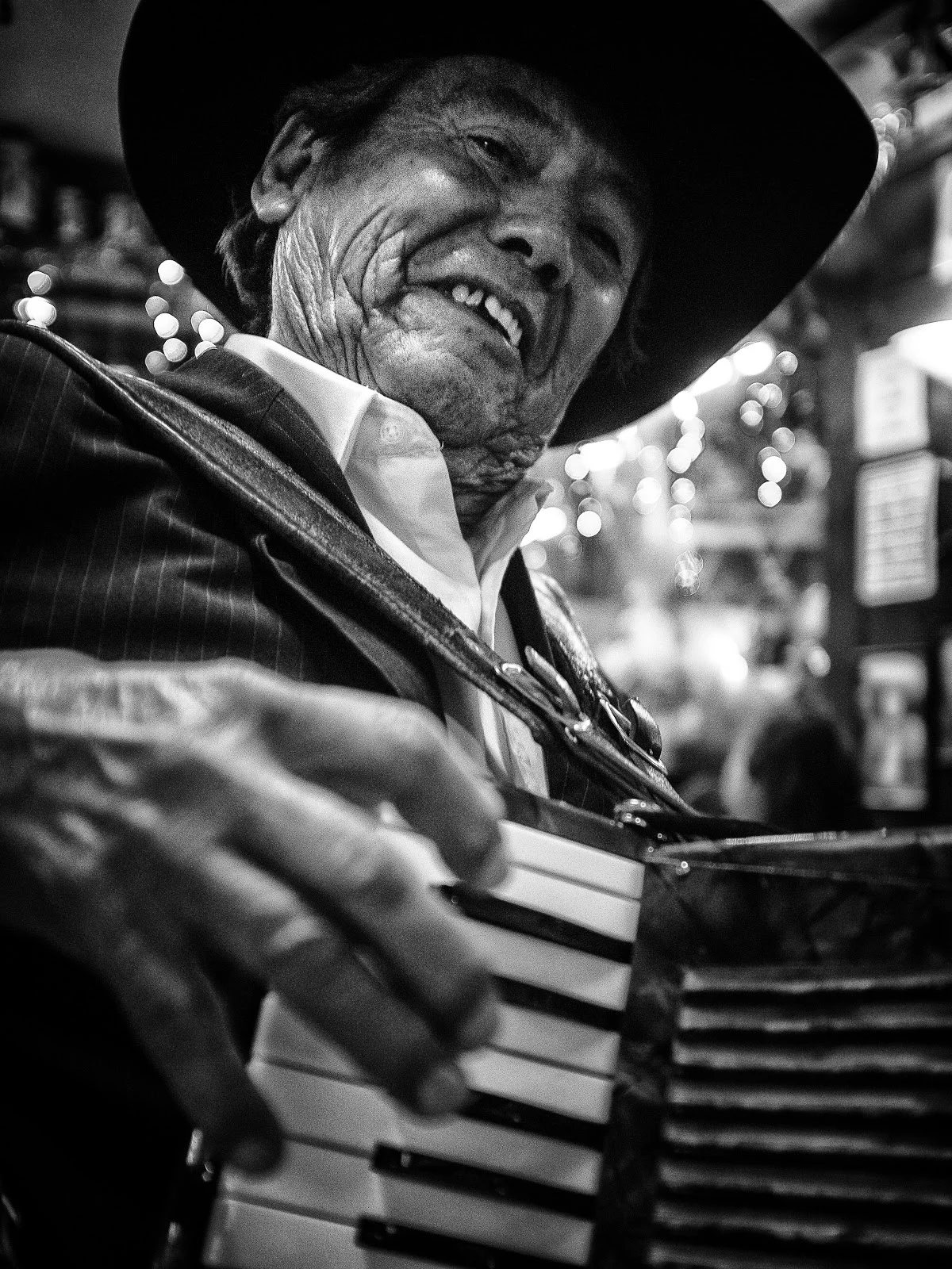 A shallow depth of field here helps define the man’s face as the subject.