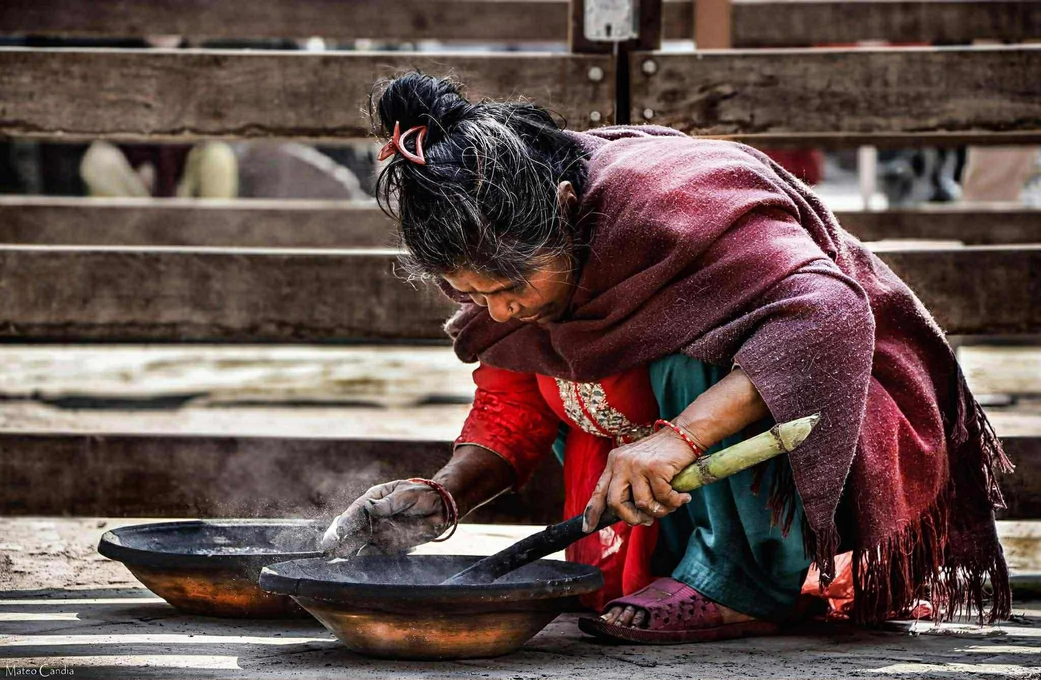 Mateo Candia – Vibrant colours and neutral hues draw you into this woman’s world. Sitting on her haunches, working with her potion, you can almost feel her concentration. A beautifully shot scene.