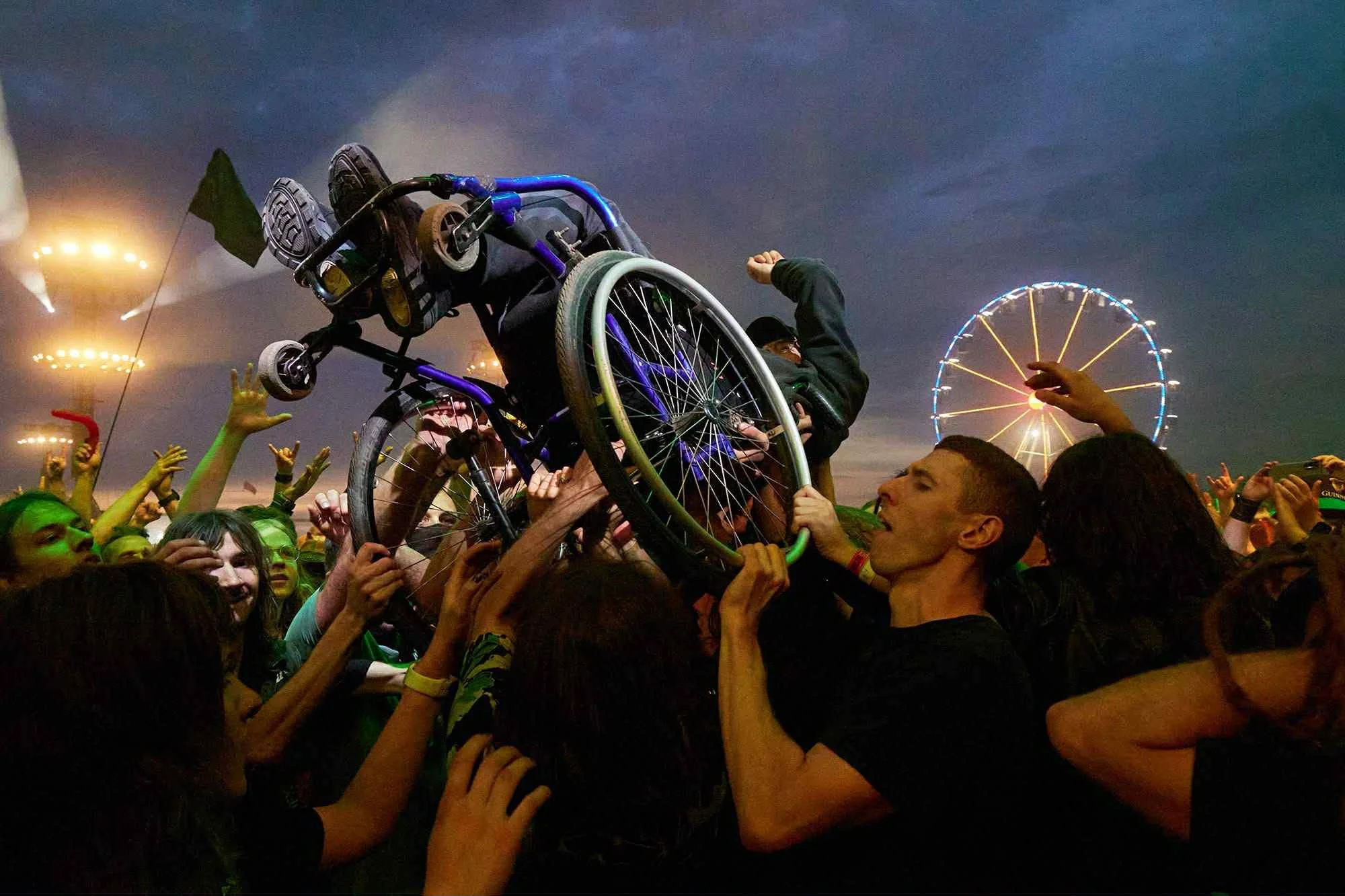 Janusz Jurek This shot gives a whole new meaning to the phrase ‘crowd surfing’ and exemplifies - without being patronising - how much nicer the world is when people are caring and inclusive.