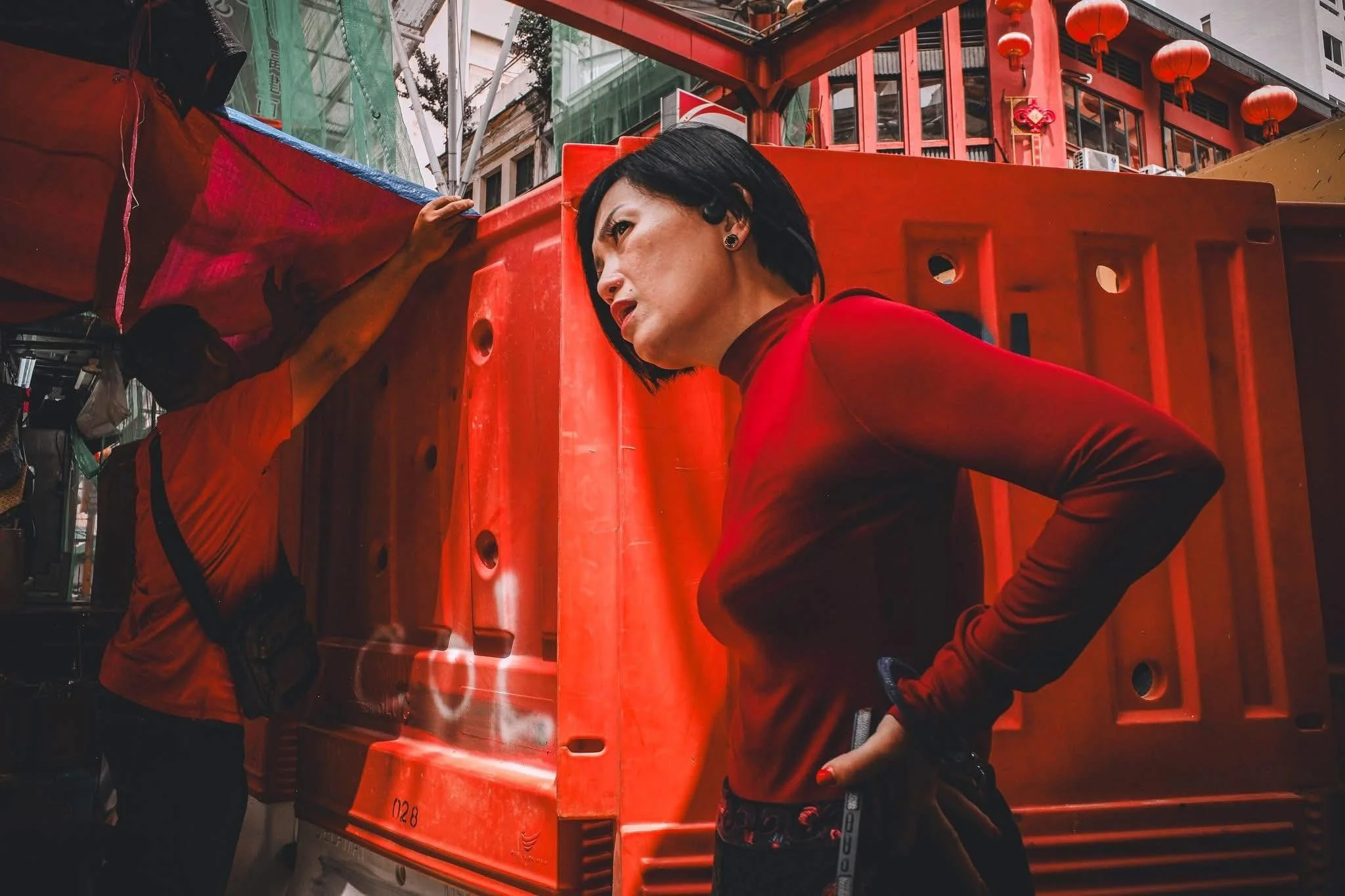 Alex Lim – praises a photo for its striking red colour and skilful photography and editing, highlighting how the characters dressed in red stand out against the red background.