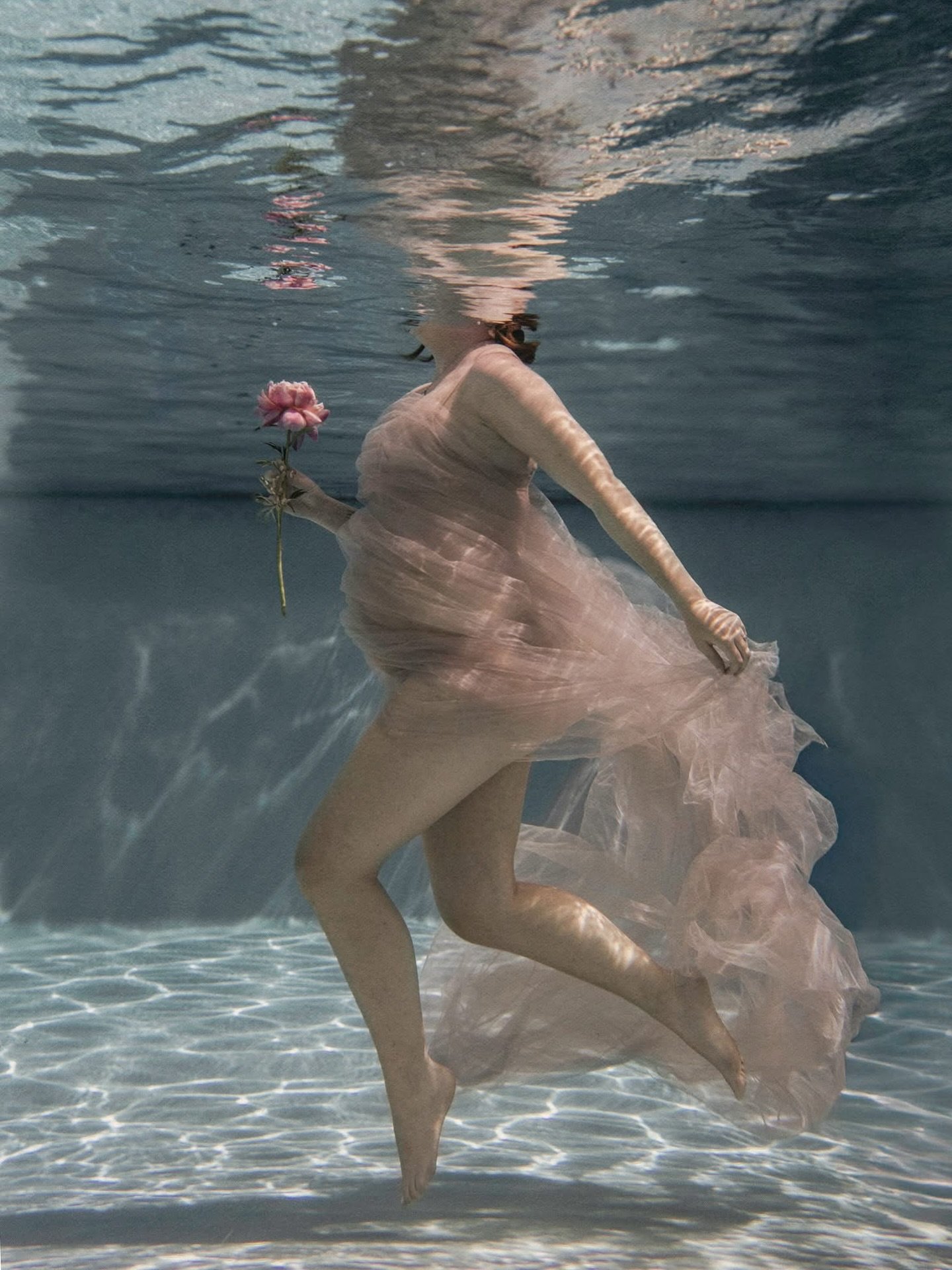 Suspended in stillness, wrapped in light, and glowing with the quiet magic of motherhood.

Lauren ❤

www.kirstyjoyphotography.com