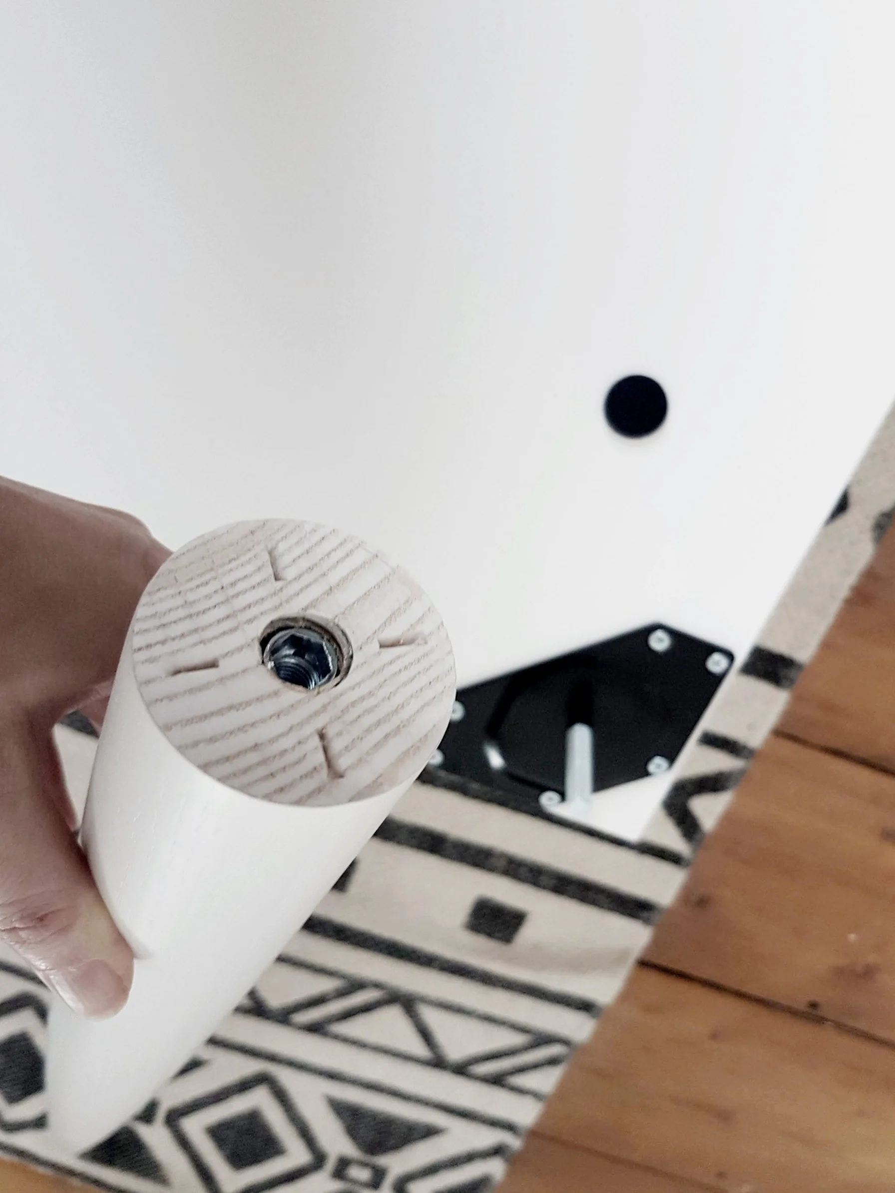 ATTACHING THE LEGS FROM PRETTY PEGS TO ADD STABILITY TO THE DRESSING TABLE