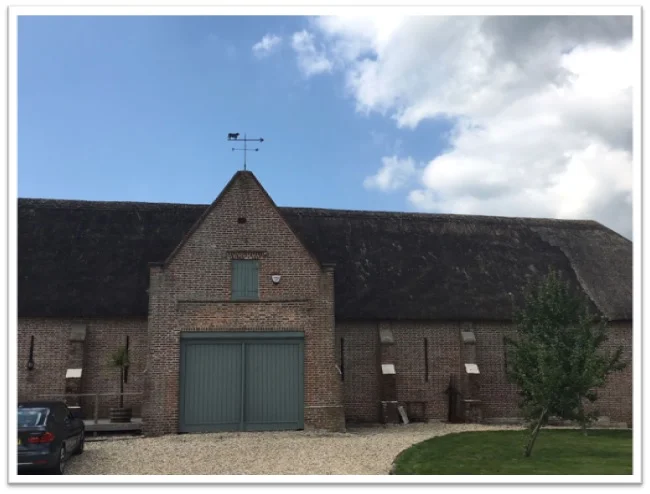 William Holland makes hand crafted baths, basins and more, and stores them all in these gorgeous buildings. The day we were there, a dairy cow came calling, right up to the front door. Can you believe they are still using thatched roofs?