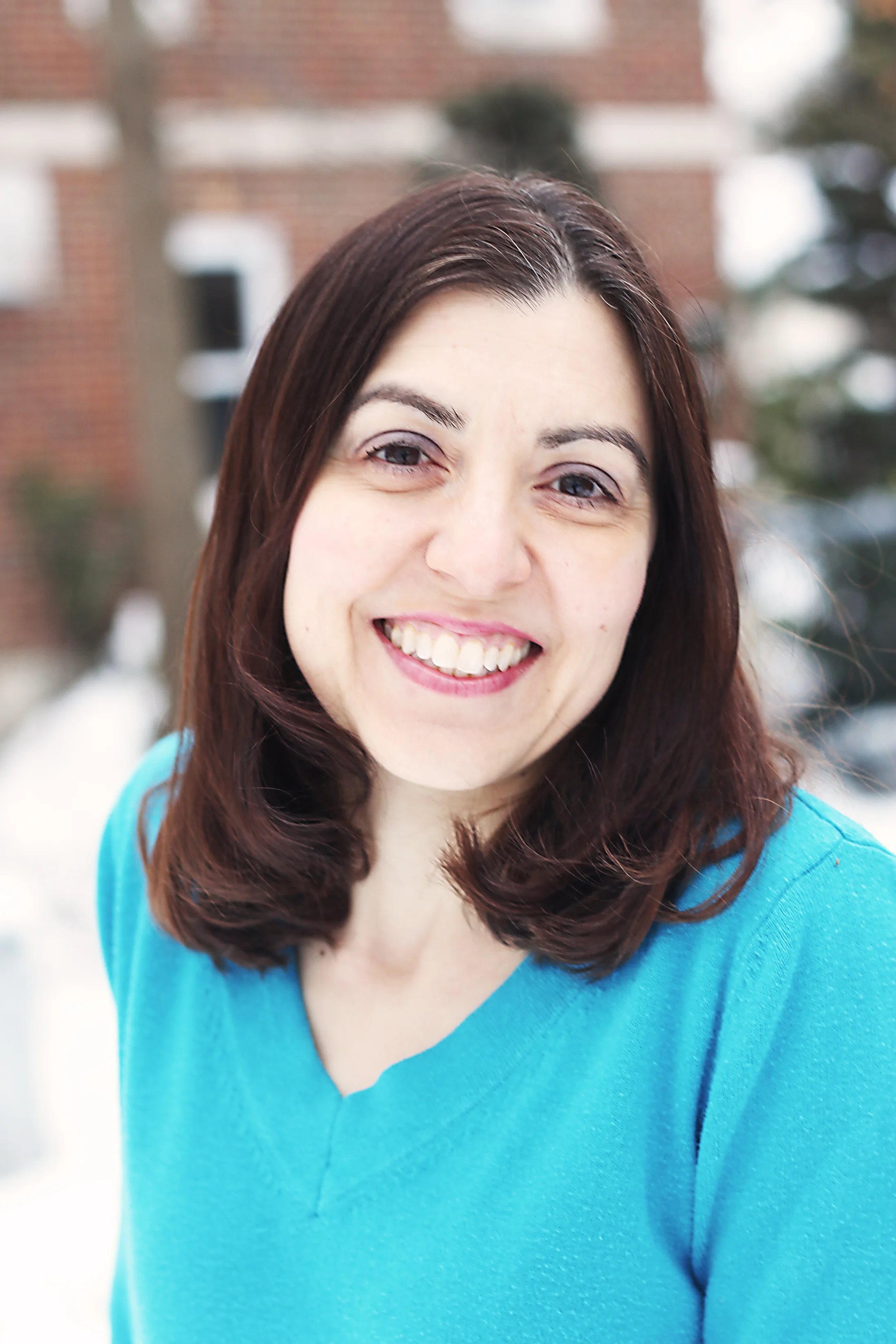 Emily Regas headshot.jpg