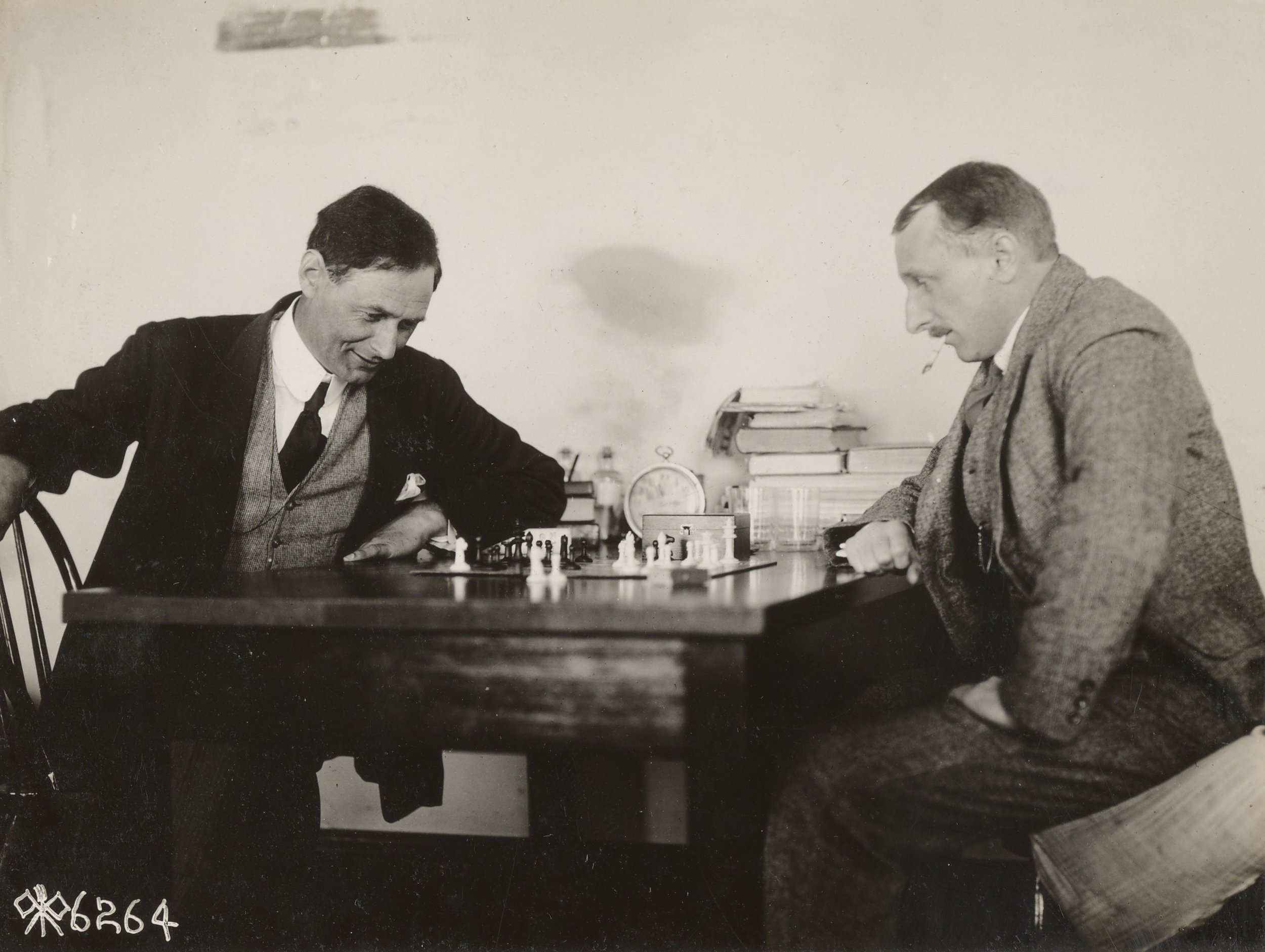 "Interned Germans and Austrian playing a game of chess," March 5, 1918