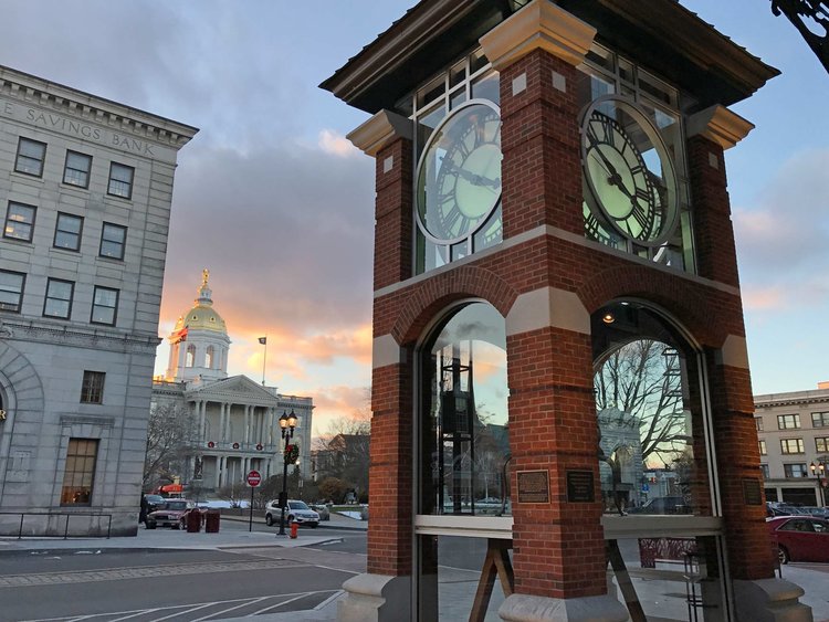 City-of-Concord-clock-tower-and-New-Hampshire-State-House.jpg