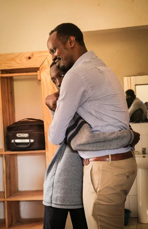 Vincent+Hugging+Student.jpg
