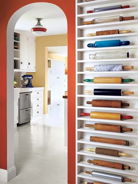 A cute, colorful, curated collection. These types of display have to be taken into consideration during a renovation because of the specific sizes of the items.