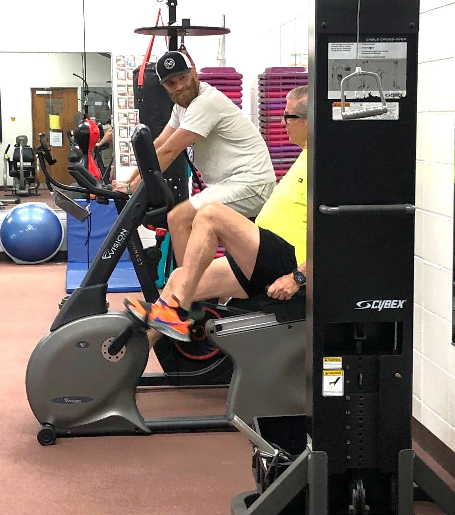 Two men on recumbent bikes