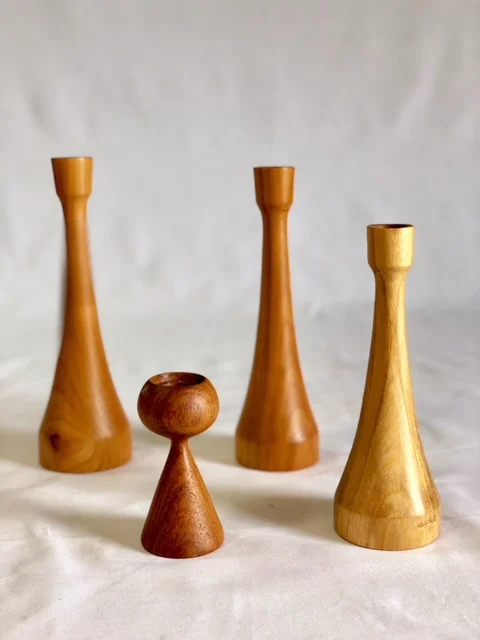 set of mid century candlesticks.  wood.