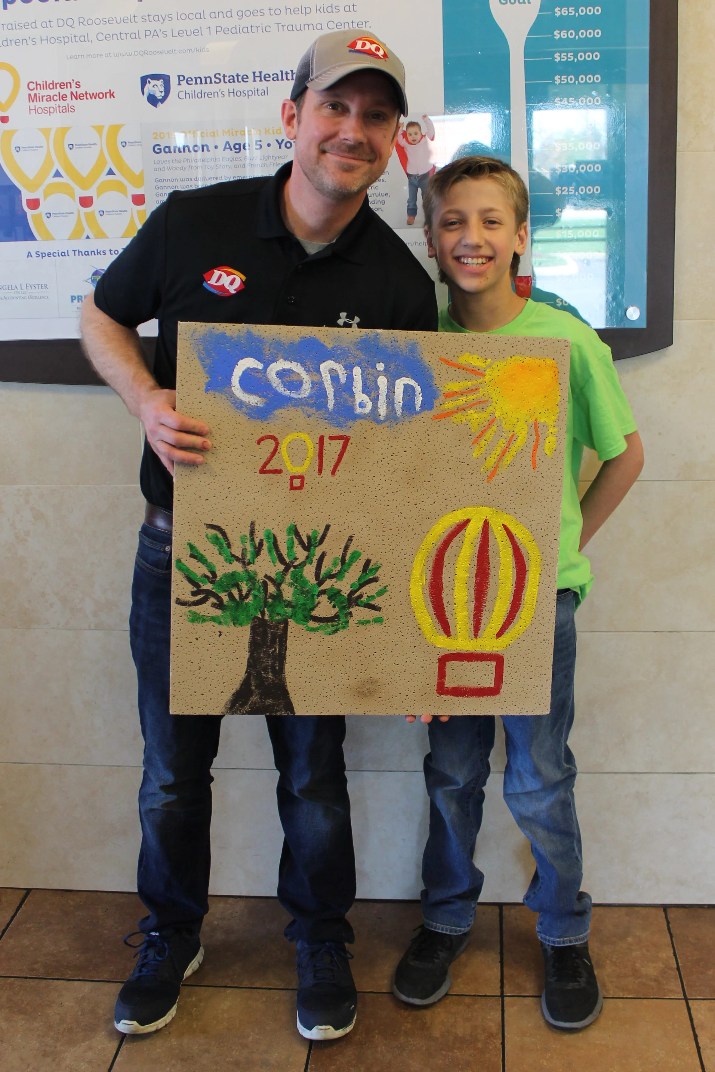 Corbin with John Miller from DQ. Corbin is a fighter, beating all odds as a baby, and now continuing to grow into an amazing man!