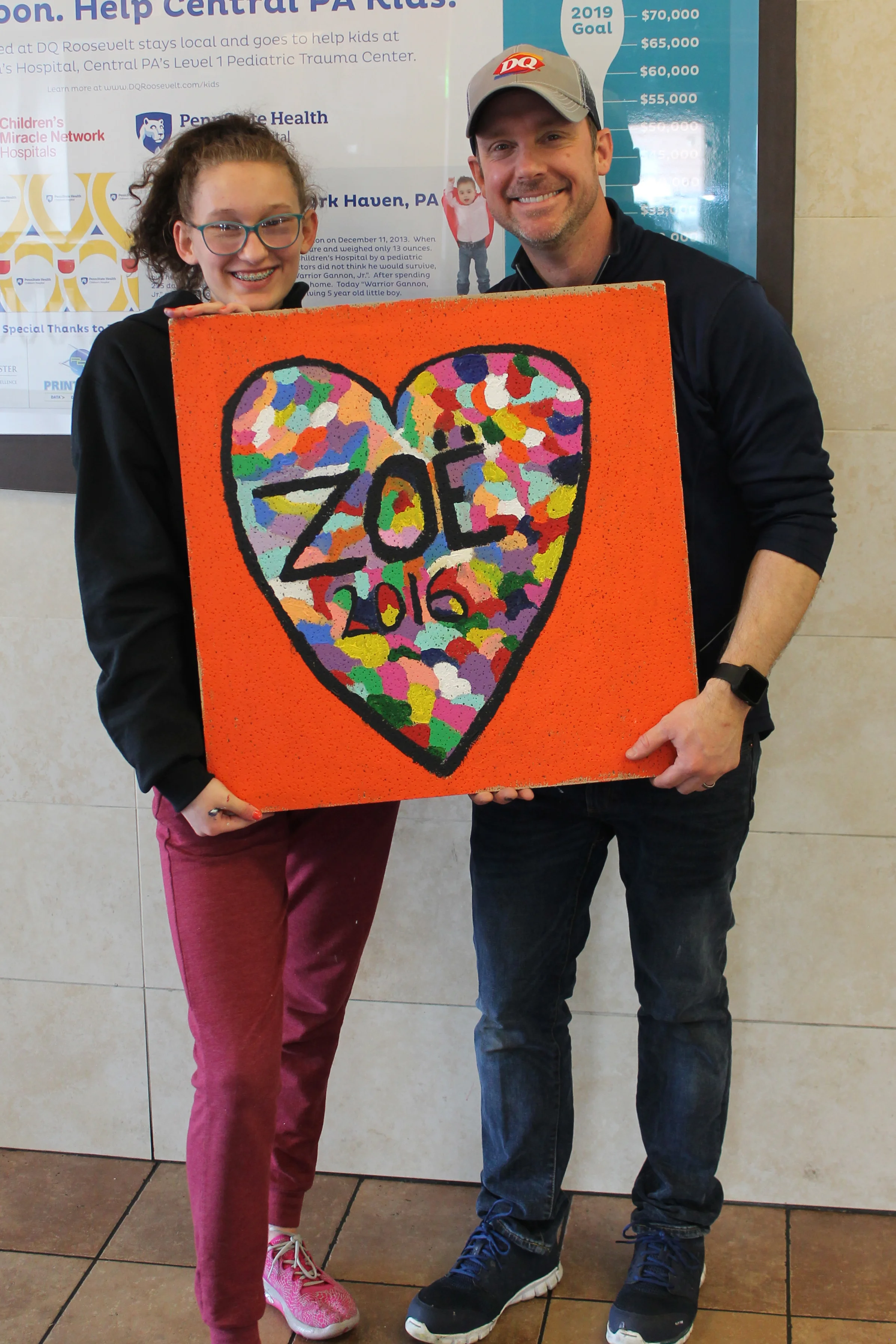 Zoe with John Miller from DQ. Zoe is one of the sweetest people you have ever met! She is full of joy and a deep love for other people.
