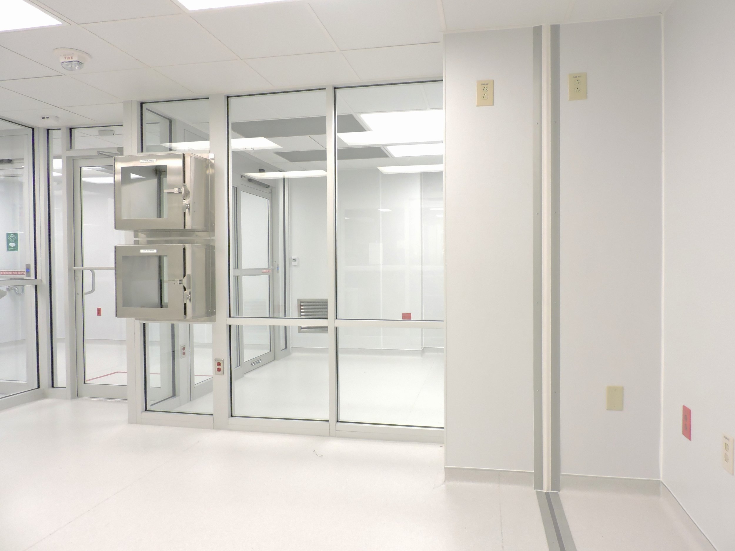 Bi-directional swing door. Pass-thru windows.