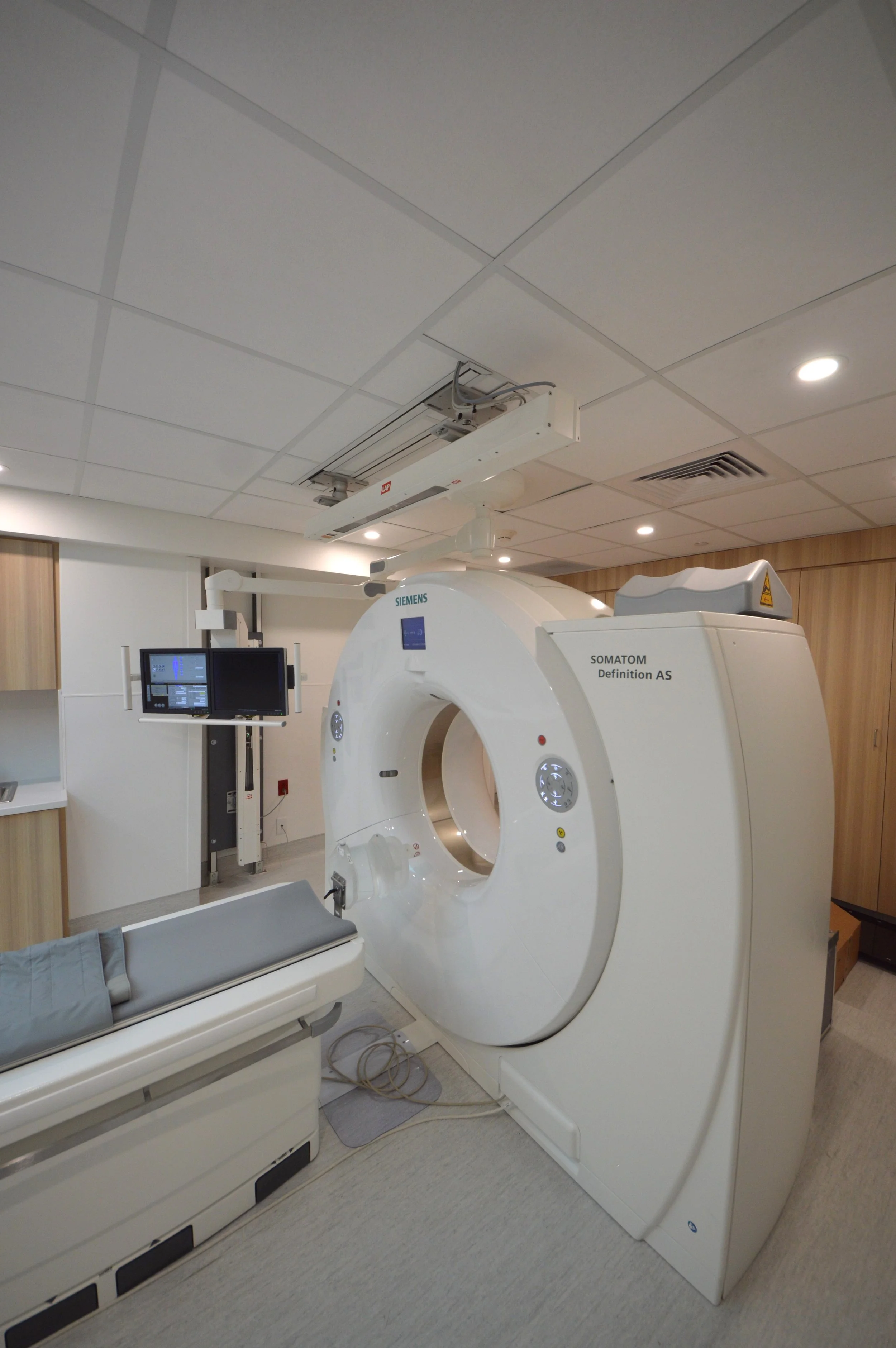 Interior renovation of two existing procedure rooms and a control area into a new Siemens Somatom-Force-CT, a fluoroscopy room, new LineUP CurveBeam equipment room and its control area.