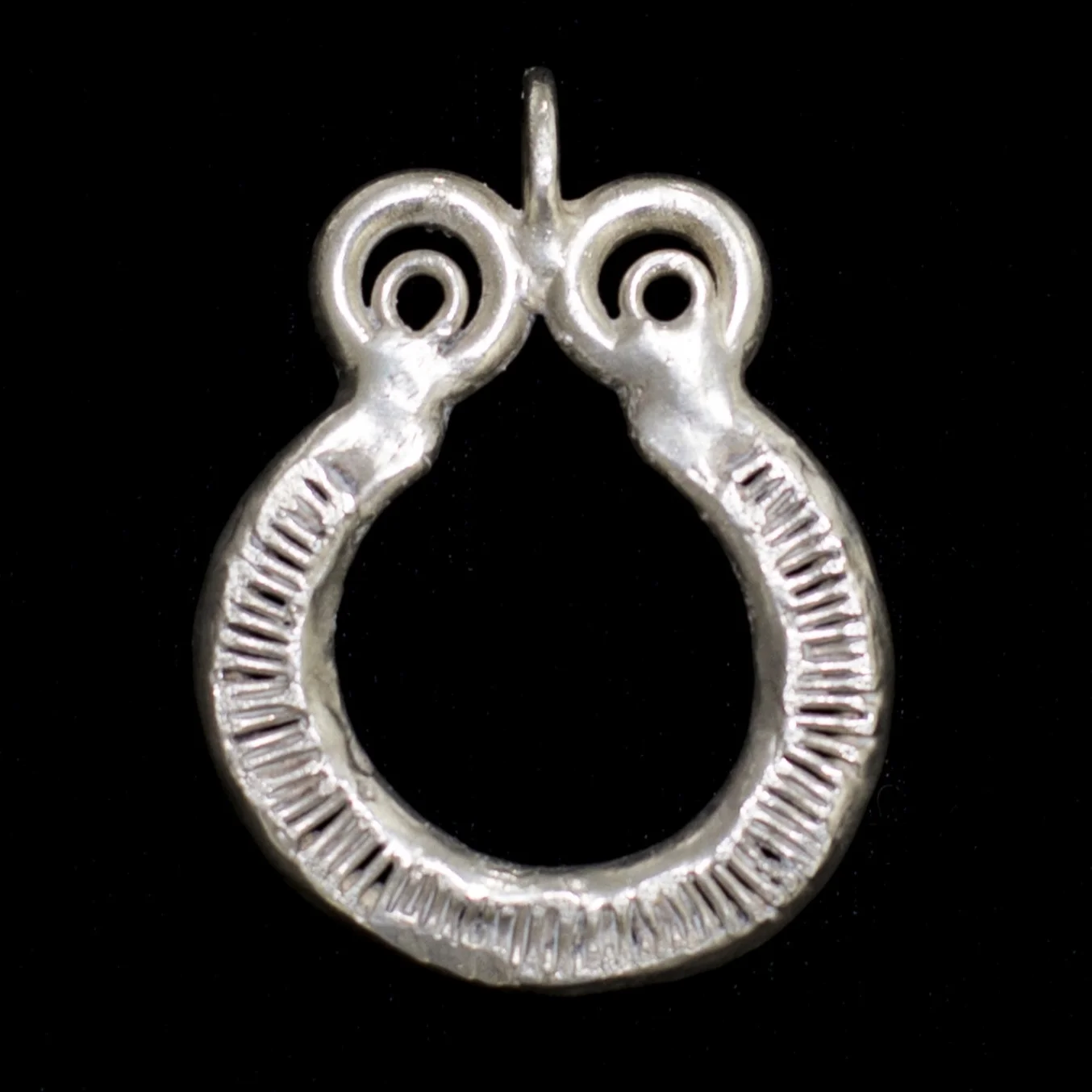 "Untitled" by Michael Malpass, circa 1973-74. silver jewelry. (photo: Tina Collella)