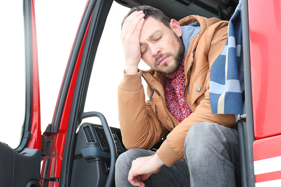 bigstock-Driver-in-cabin-of-big-modern--167739014.jpg