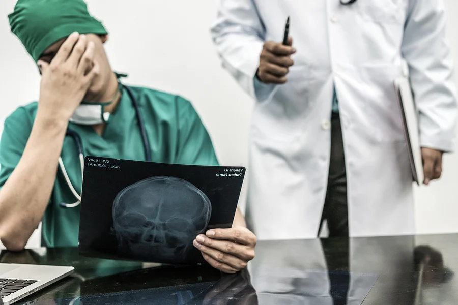 bigstock-Doctor-Covering-His-Face-With--191496826.jpg