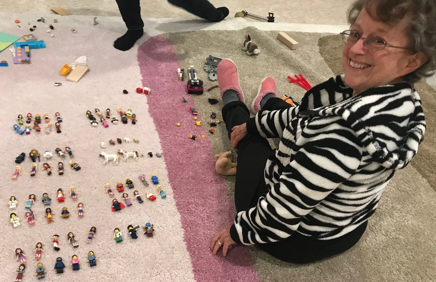 Sorting Sarah's 100 Lego figures for Day #100 of Kindergarten