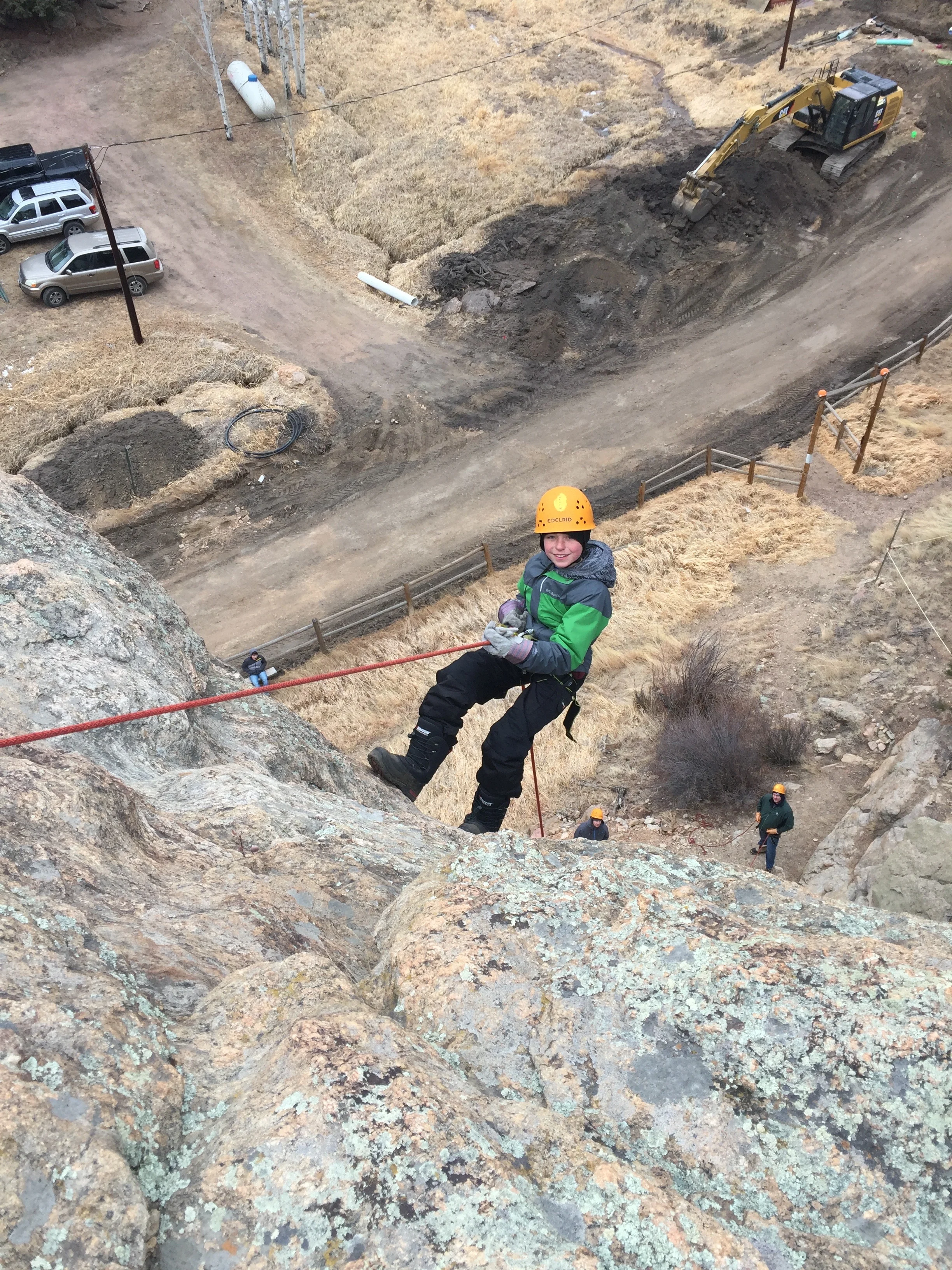 Jacob rock climbing and rappelling at Klondike