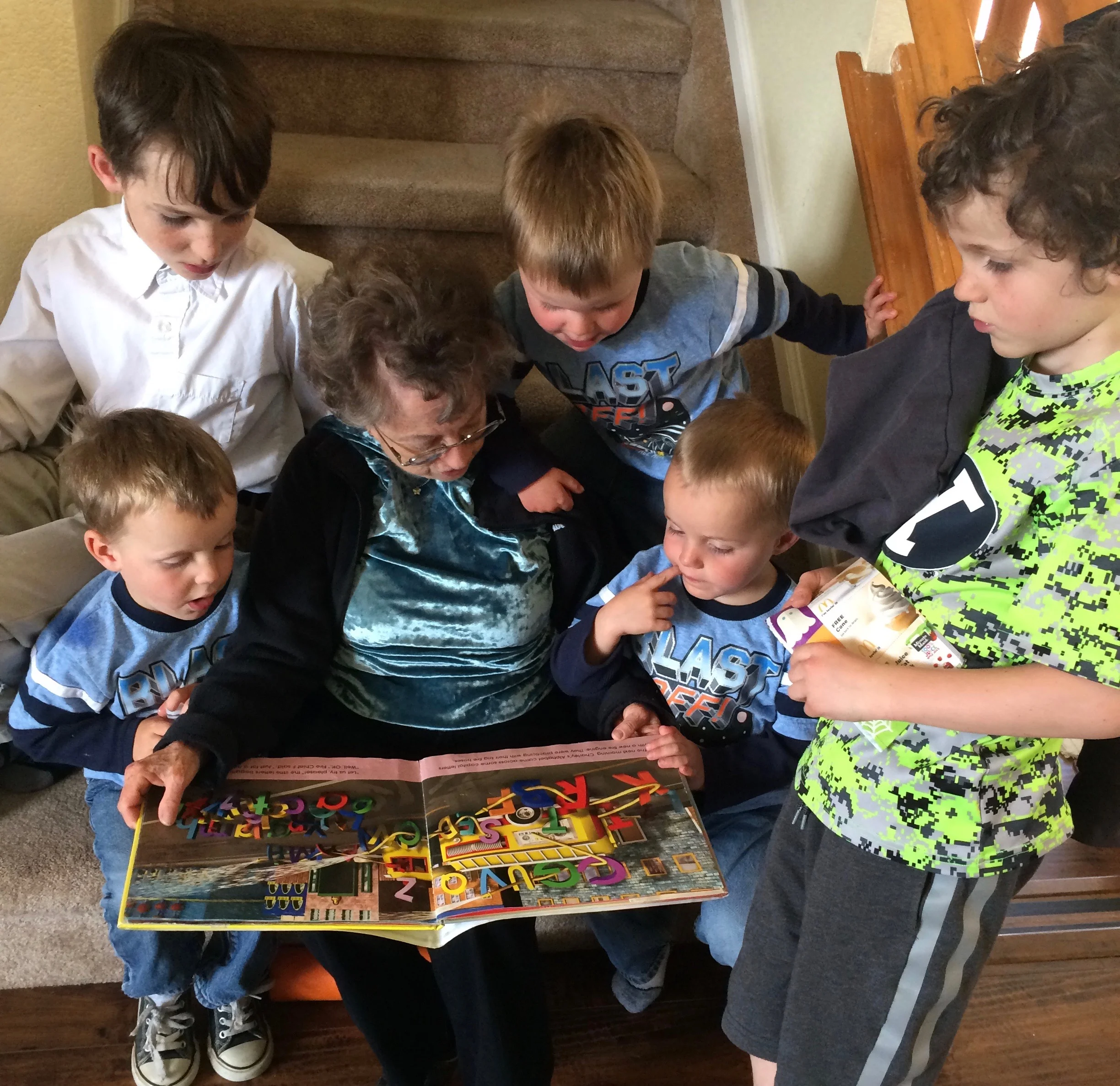 A favorite activity:  J.J. reading to the boys