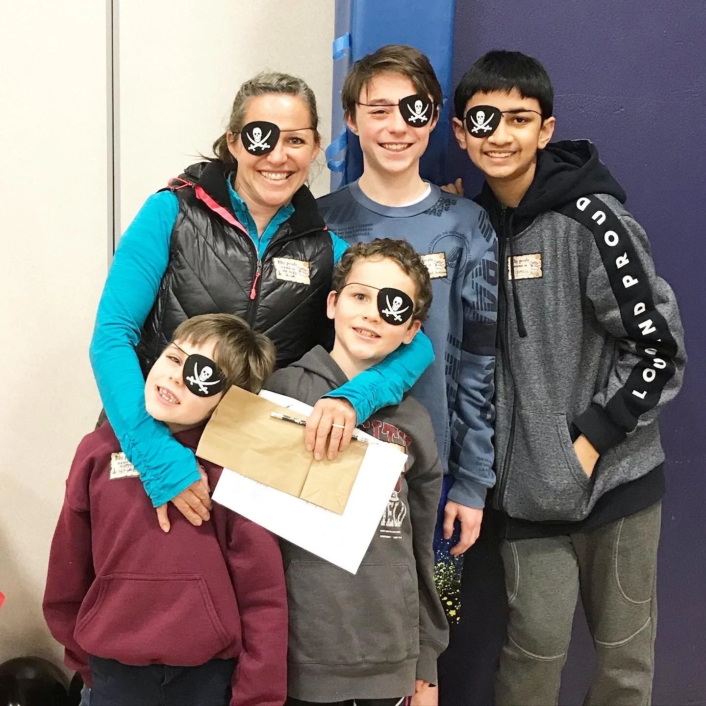  Jill with Caleb, Beckett, Jacob and their “adopted” son, Ashvin, at Mother and Sons’ Pirate Night at Challenge to Excellence Charter School 