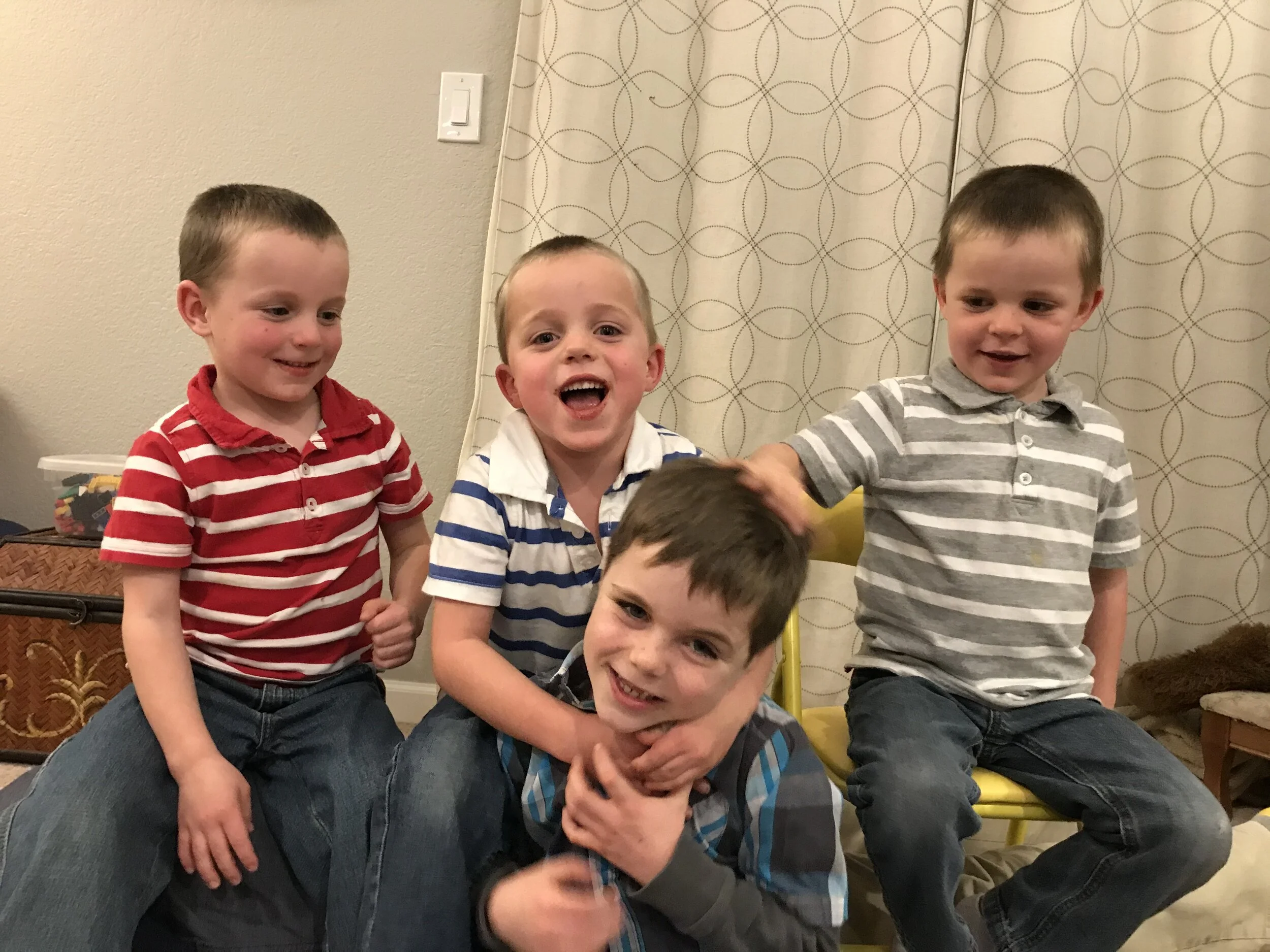  Four boys share a birthday:  Triplets turn five and Caleb turns seven 