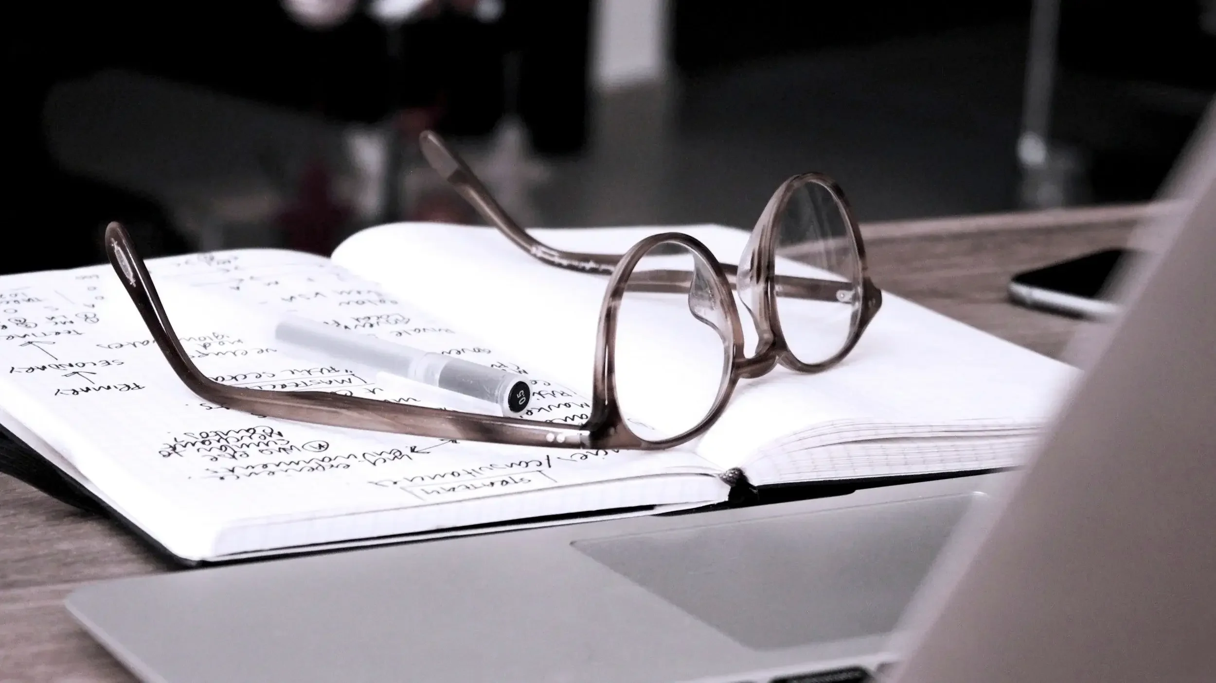 Glass placed on open book