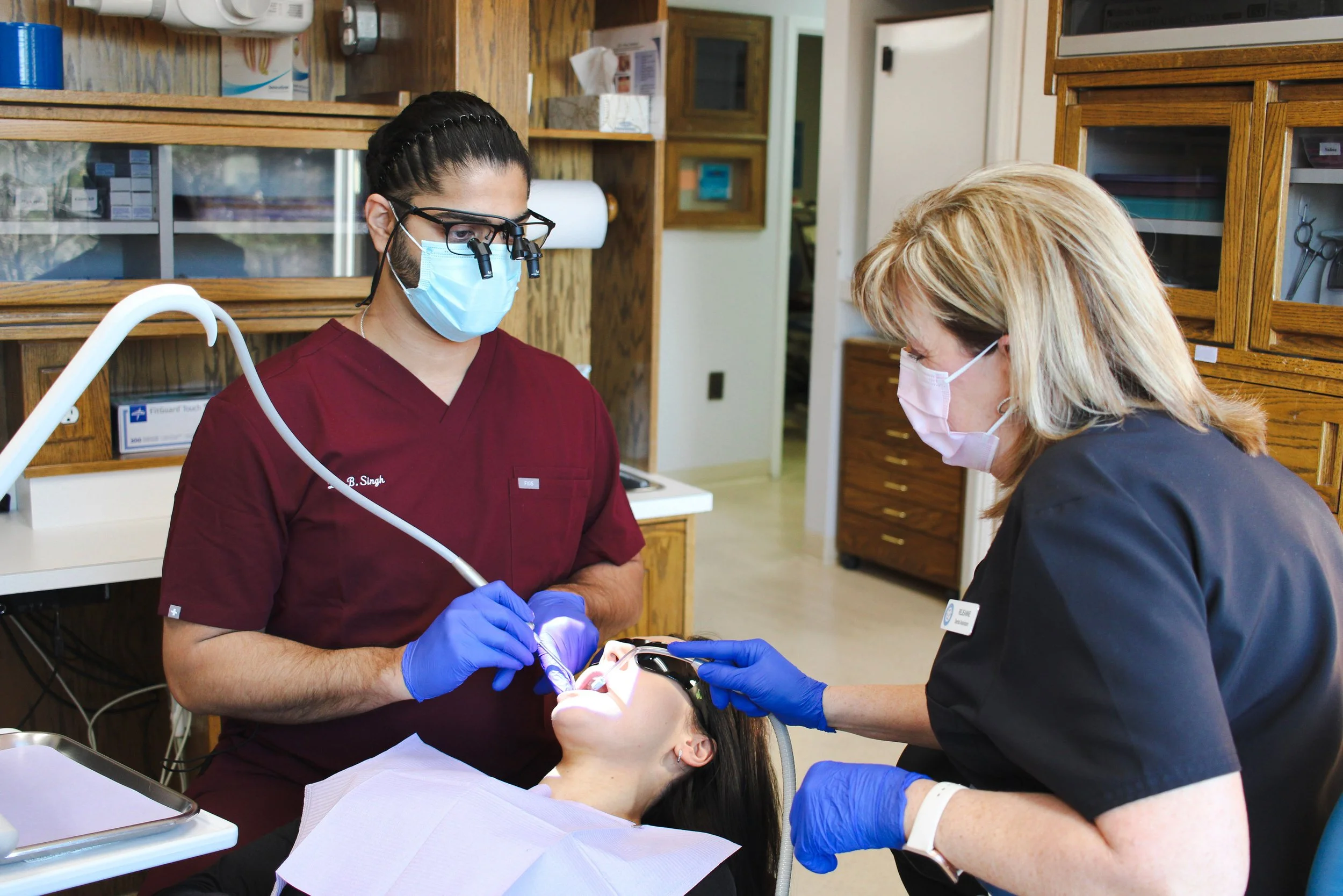 Dr. Singh, Rejeanne with patient.jpg
