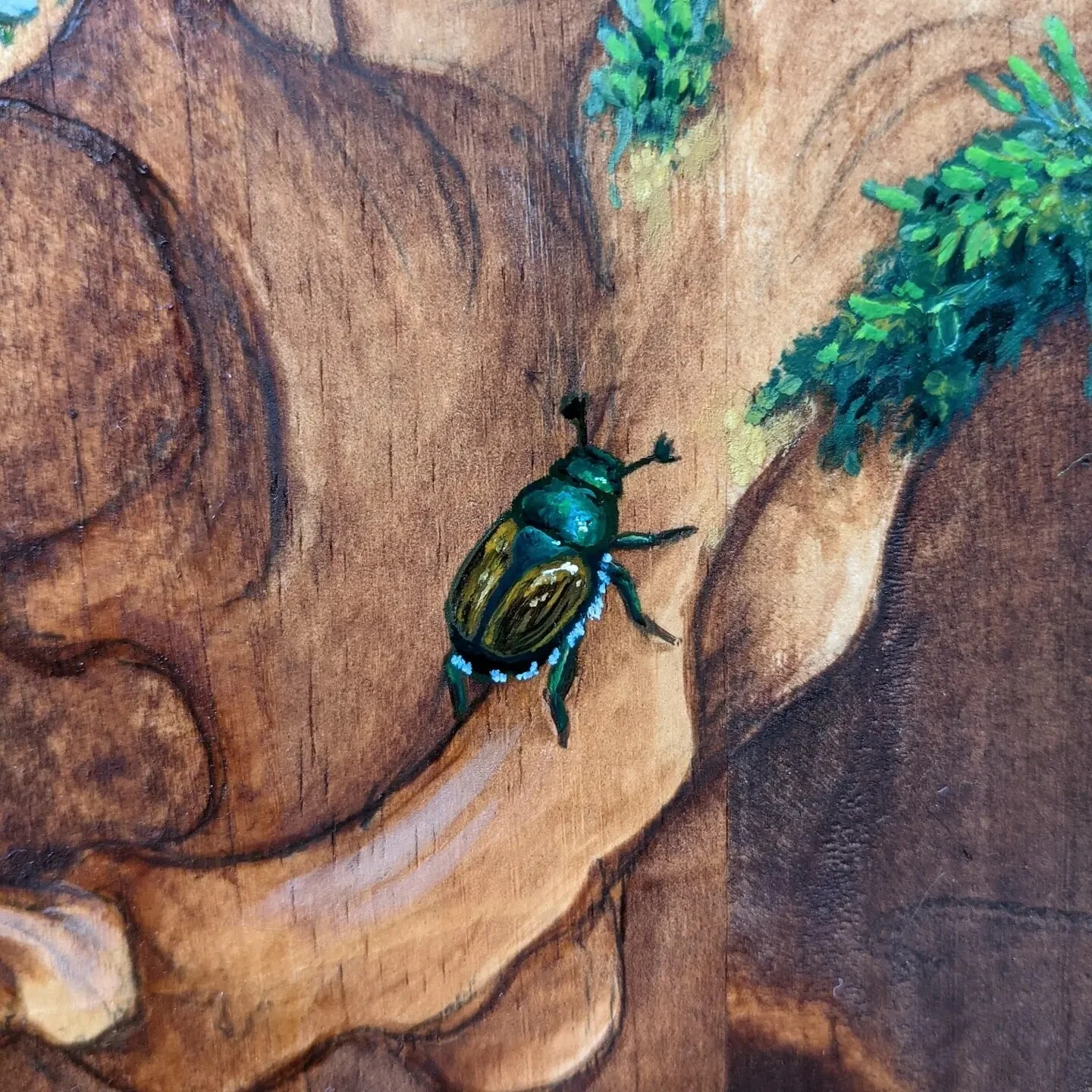 I painted a tiny beetle. It's really tiny. πͺ² Swipe to see it's tiny evolution.
.
I have a love/hate relationship with Japanese Beetles. One year they completely destroyed my peach tree. Another year they ate the shit out of my squash and tomato plan