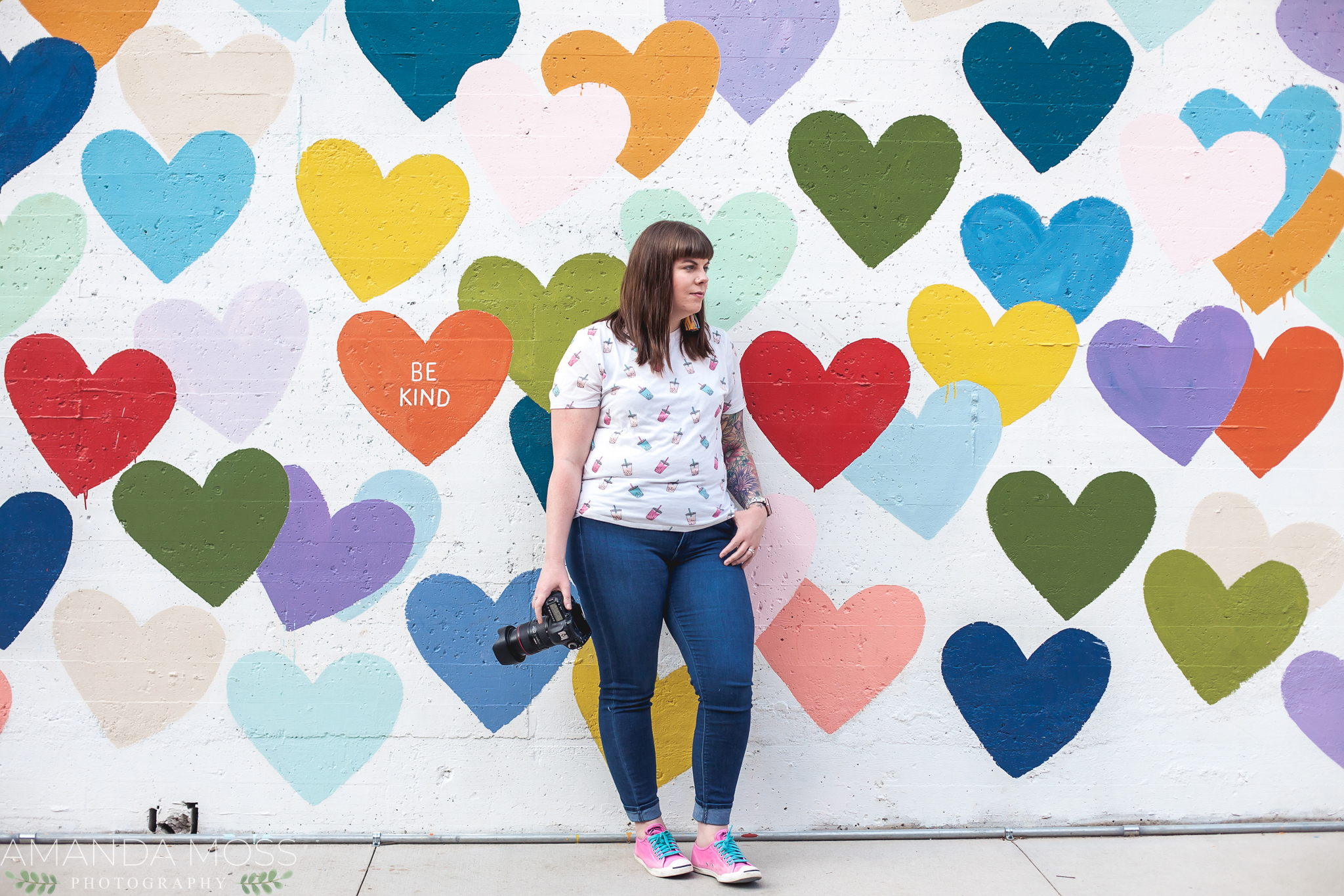 charlotte north carolina headshot branding portrait photographer south end noda fun silly confetti hearts wall