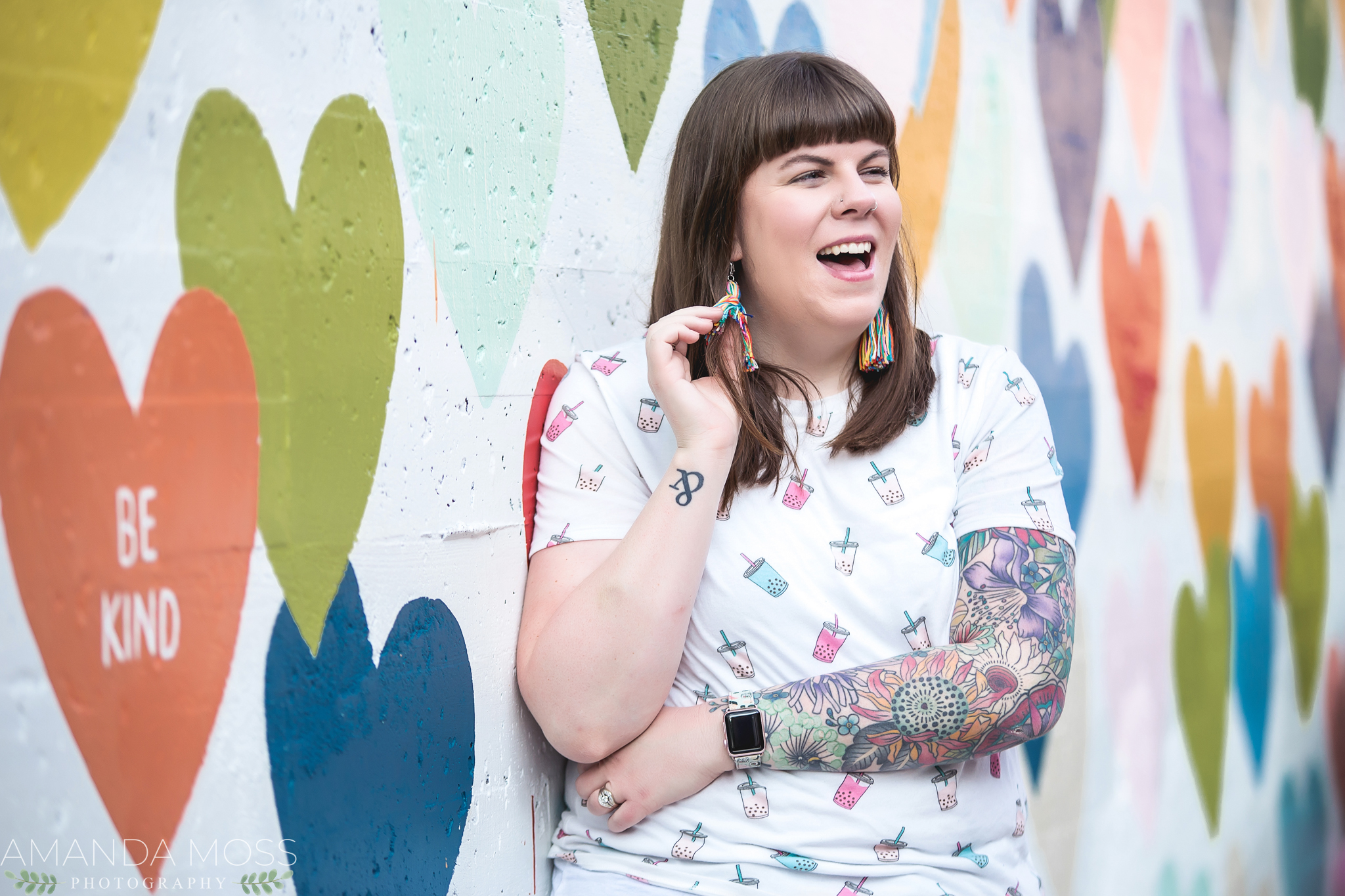 charlotte north carolina headshot branding portrait photographer south end noda fun silly confetti hearts wall