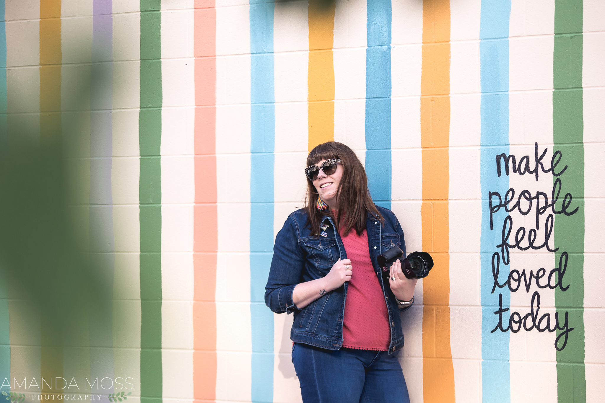 charlotte north carolina headshot branding portrait photographer south end noda fun silly confetti hearts wall