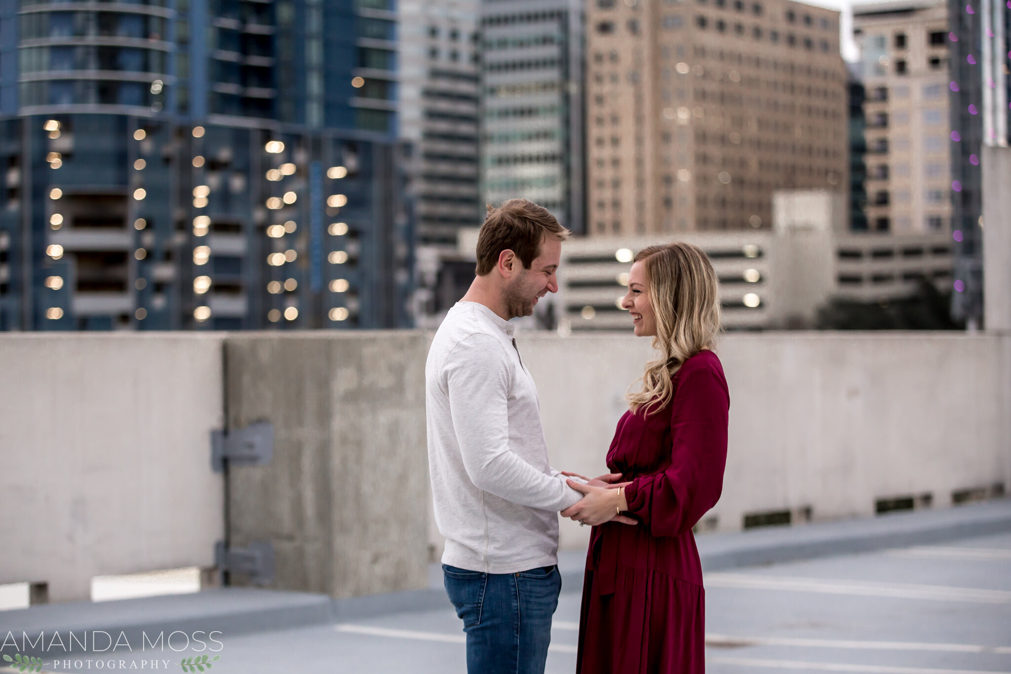charlotte nc family wedding photographer uptown rooftop skyline maternity announcement