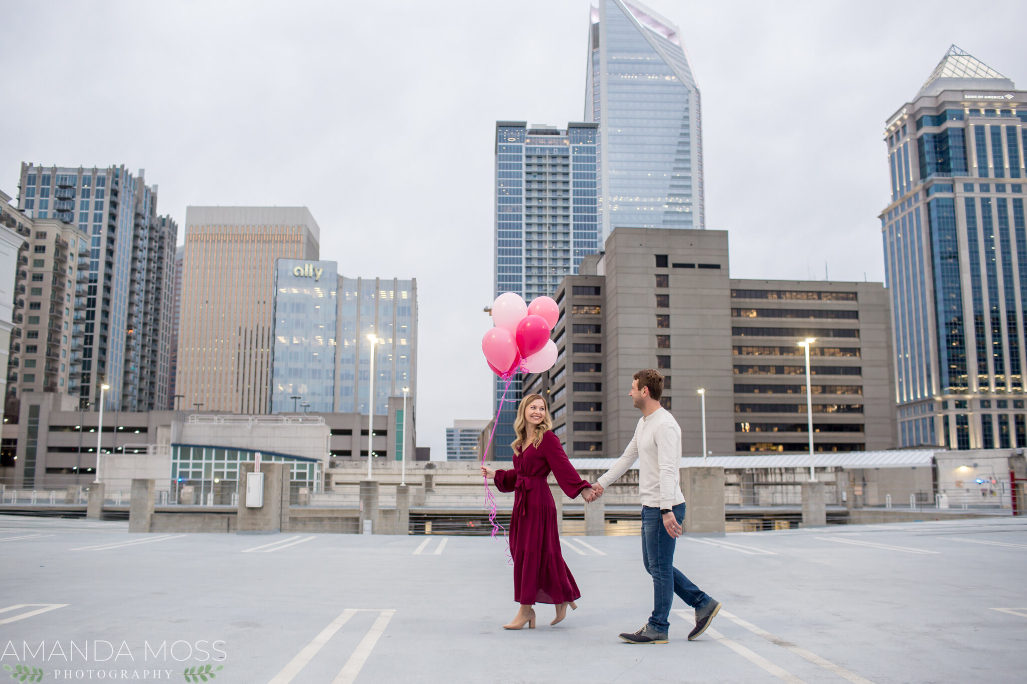 charlotte nc family wedding photographer uptown rooftop skyline maternity announcement