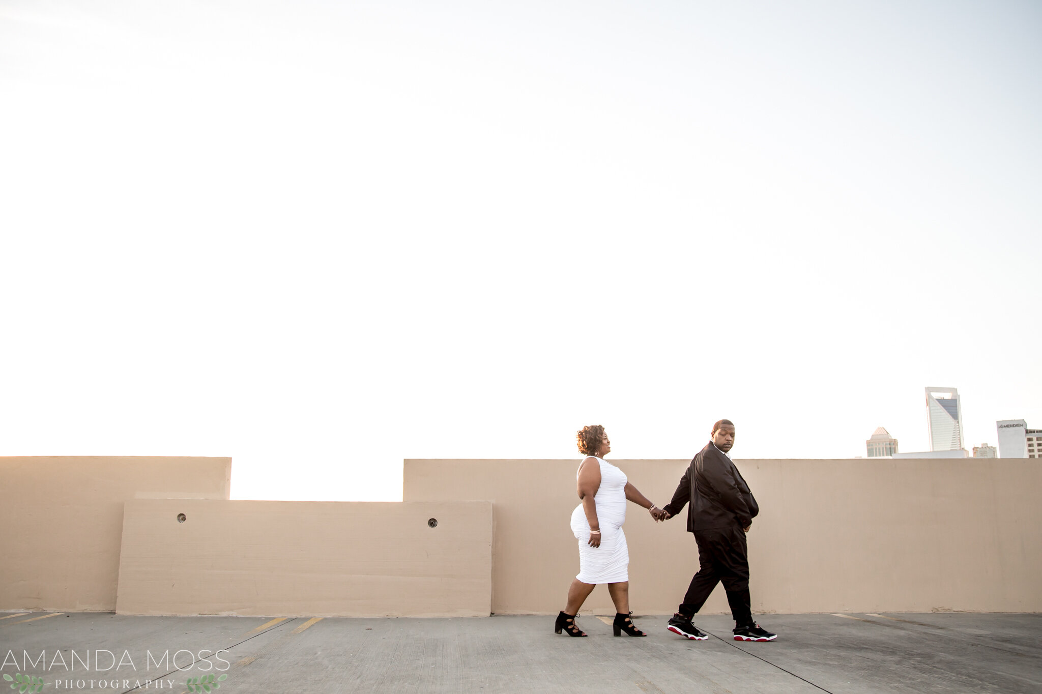 charlotte nc wedding photographer engagement session african american glencairn rooftop skyline