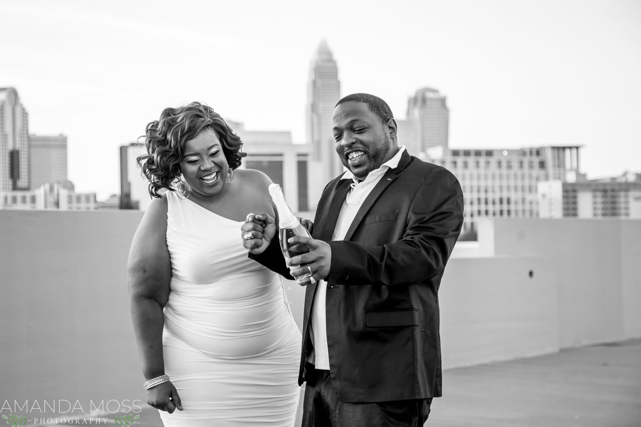 charlotte nc wedding photographer engagement session african american glencairn rooftop skyline