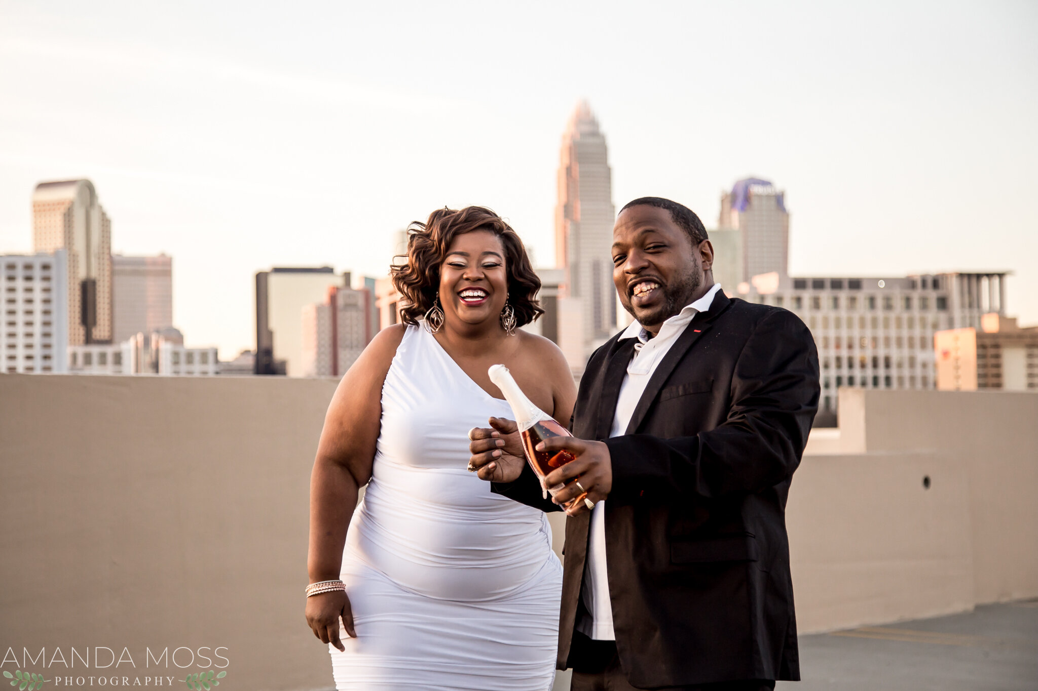 charlotte nc wedding photographer engagement session african american glencairn rooftop skyline